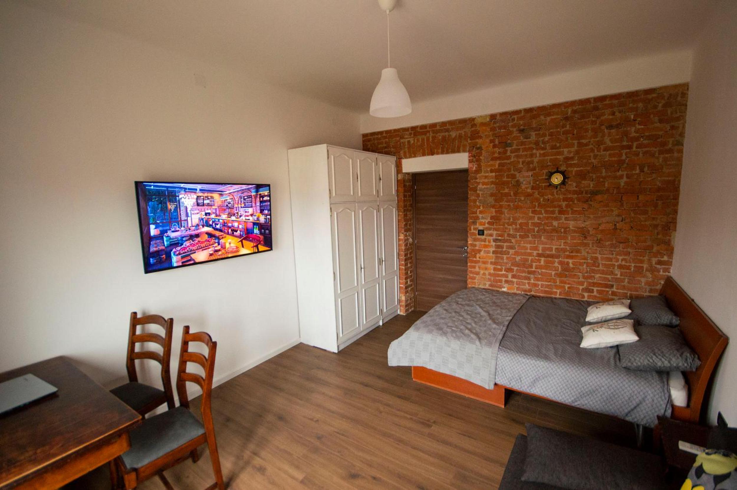 Four-Bedroom Apartment with Balcony