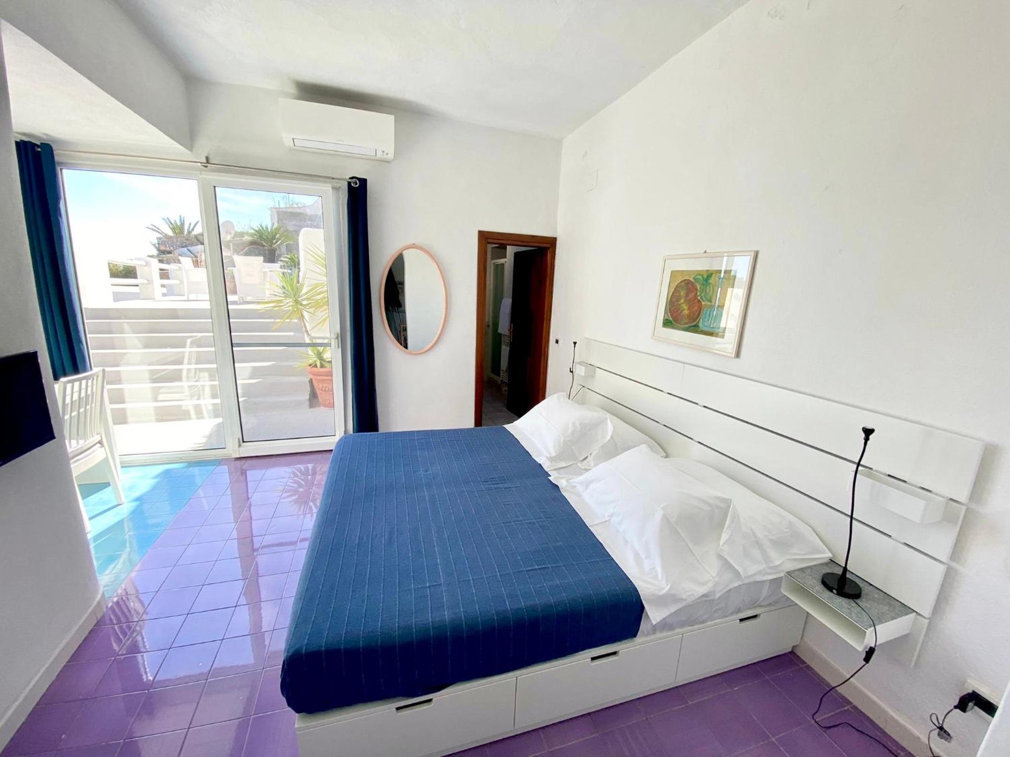 Deluxe Triple Room with Terrace and Sea View - Photo 16