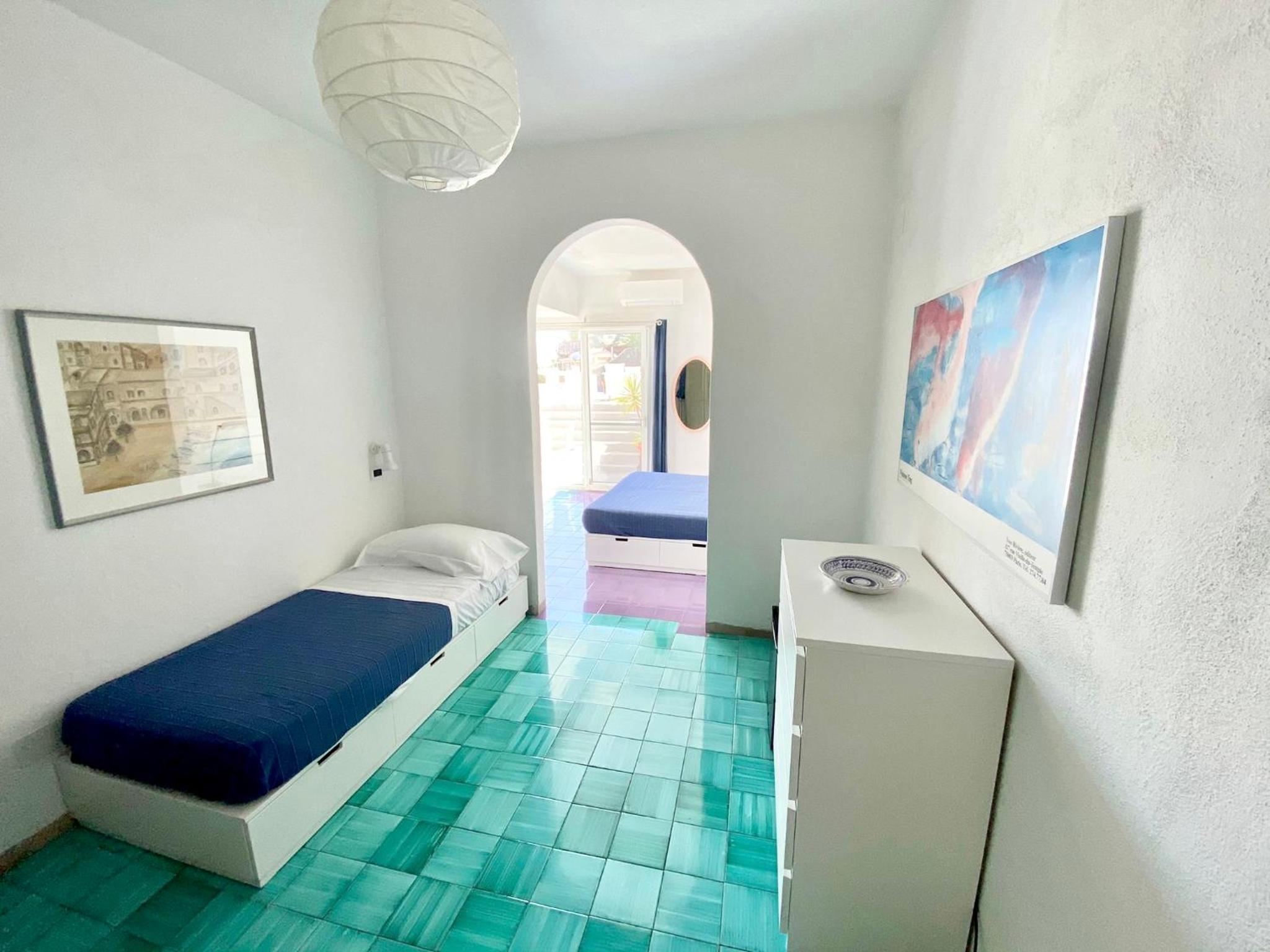 Deluxe Triple Room with Terrace and Sea View - Photo 17