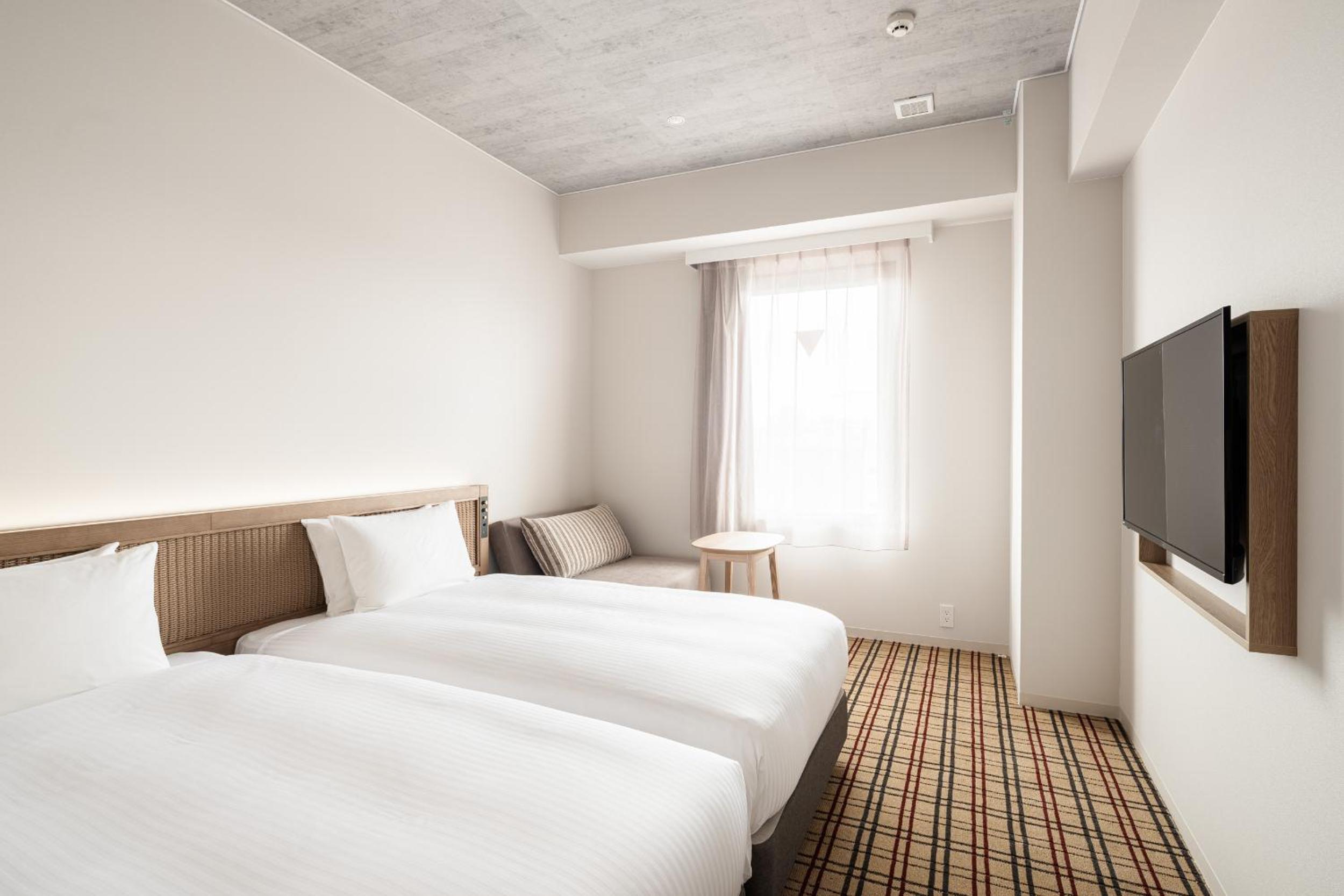 Deluxe Twin Room - Photo 2