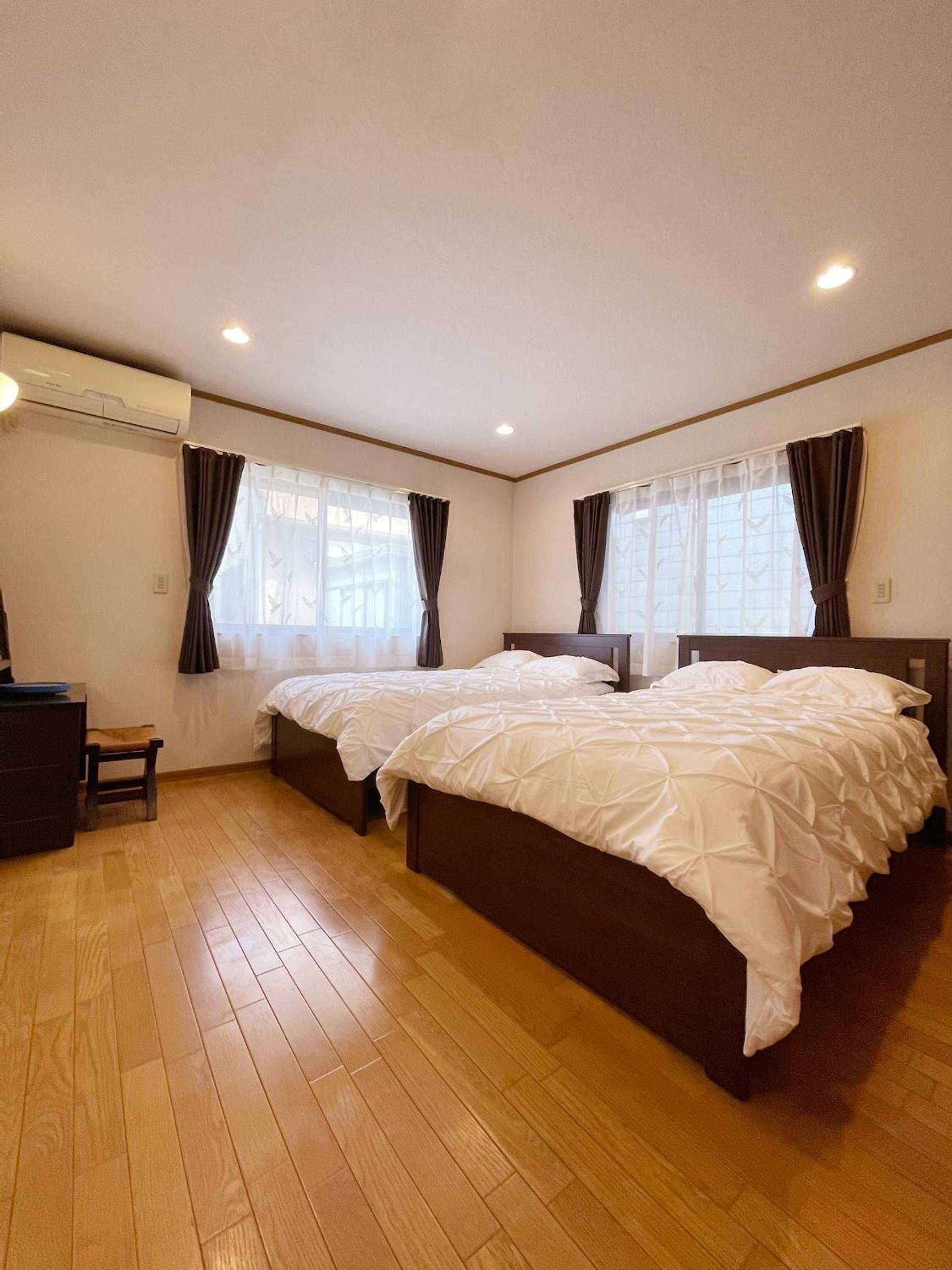 Three-Bedroom Apartment - Photo 16
