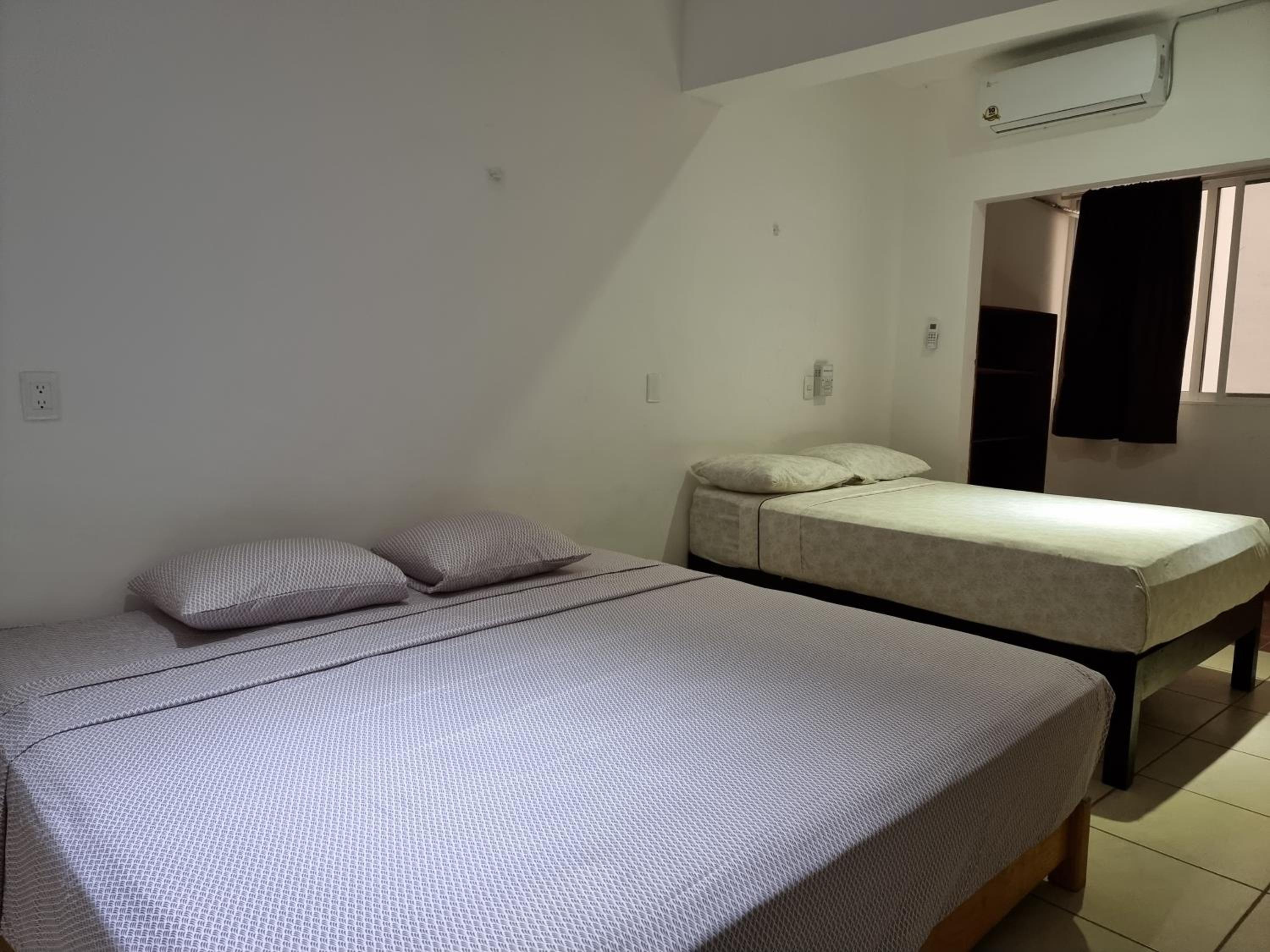Budget Triple Room - Photo 16