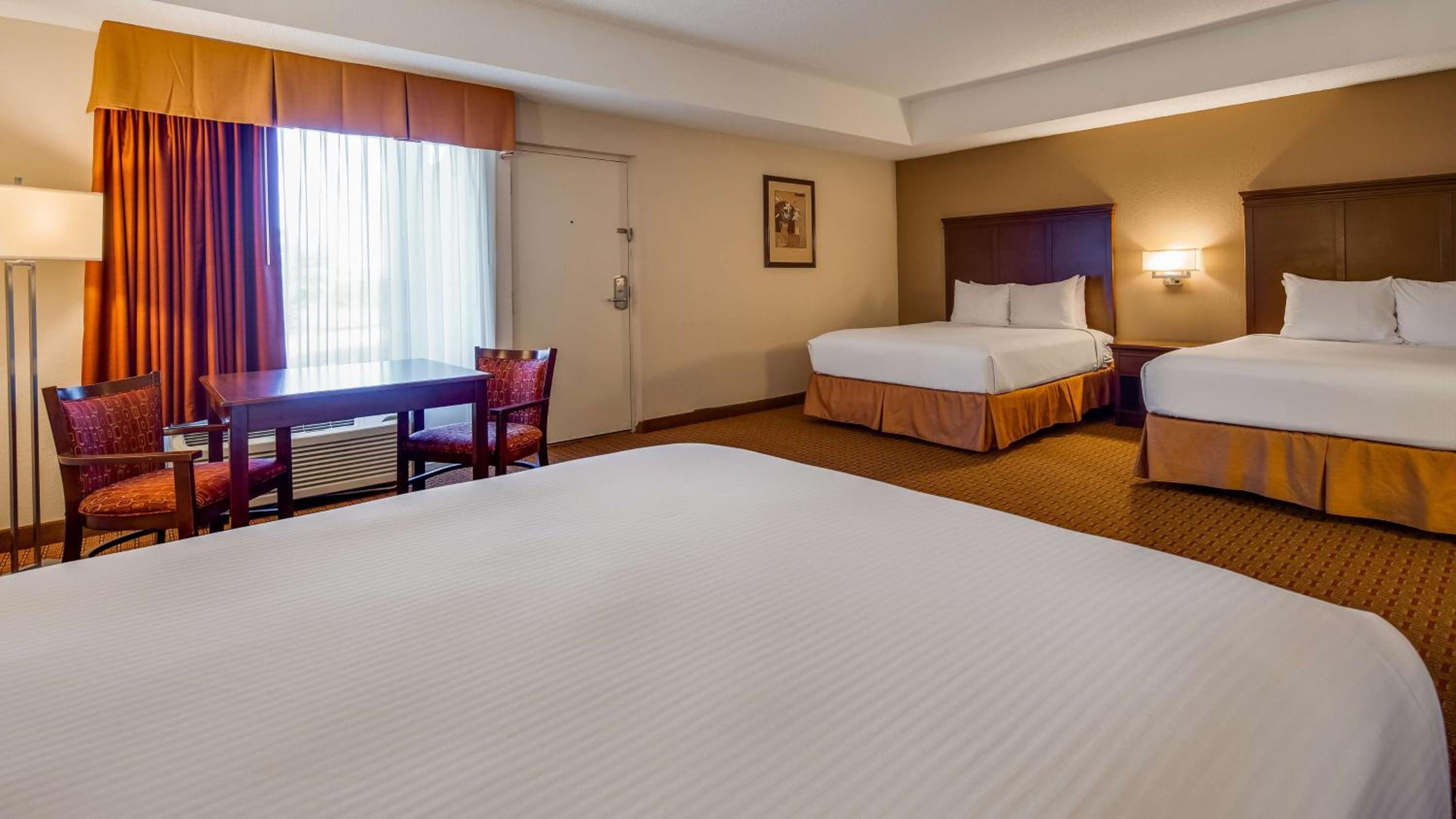 Queen Room with Three Queen Beds and Mobility Accessible Roll-In Shower photo 3