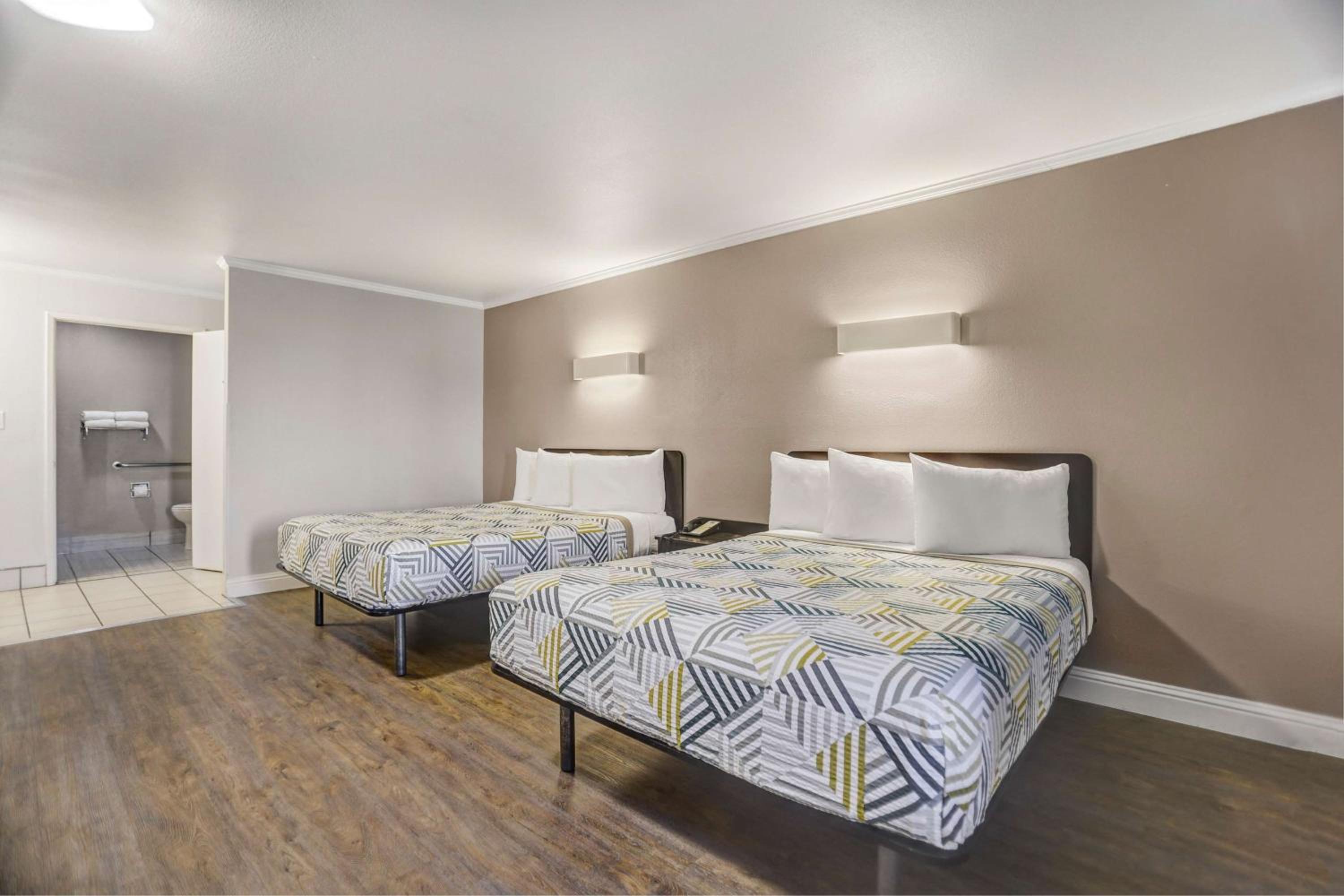 Queen Room with Two Queen Beds - Disability Access - Roll In Shower - Photo 1
