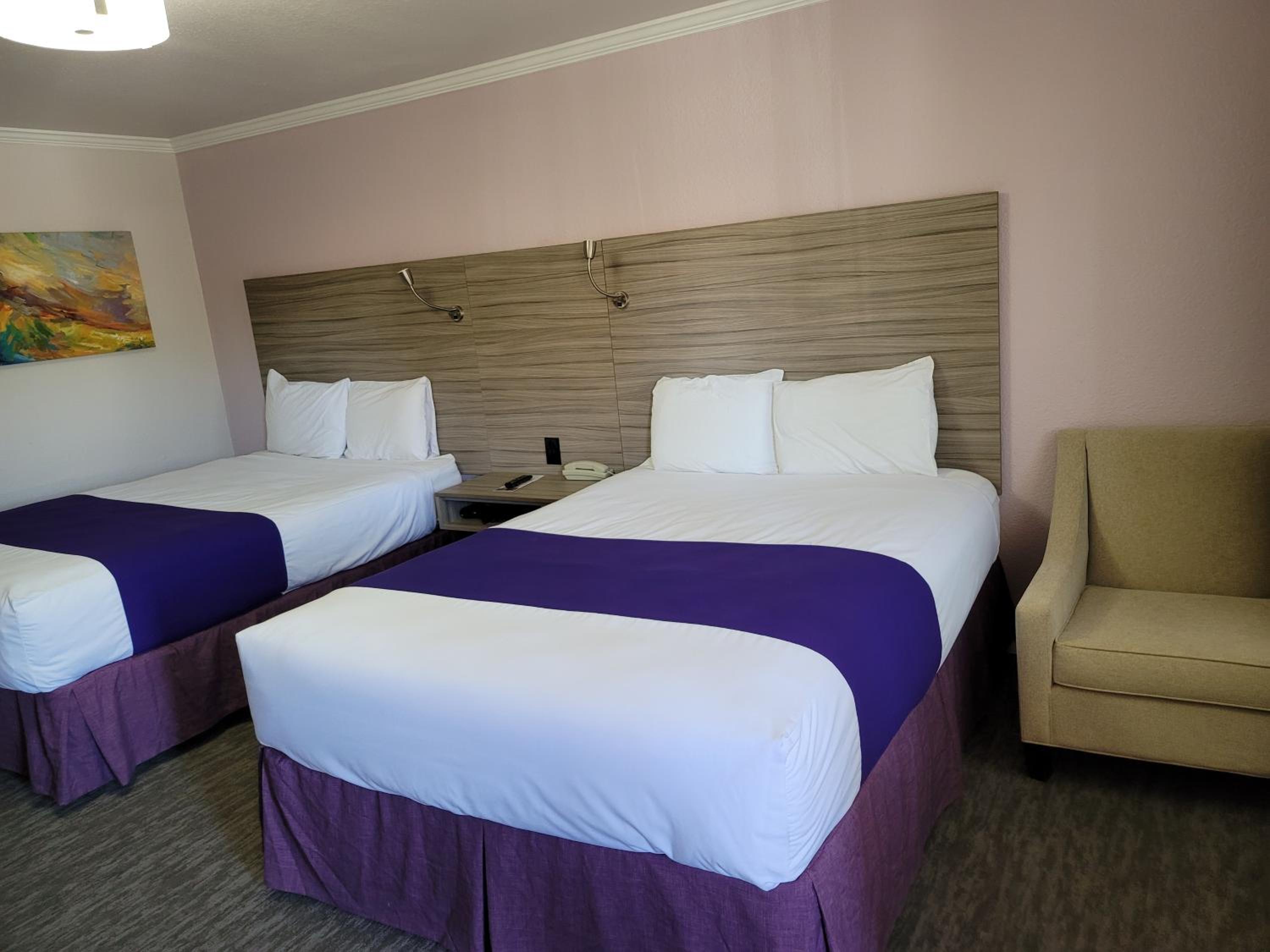 Queen Room with Two Queen Beds - Photo 1