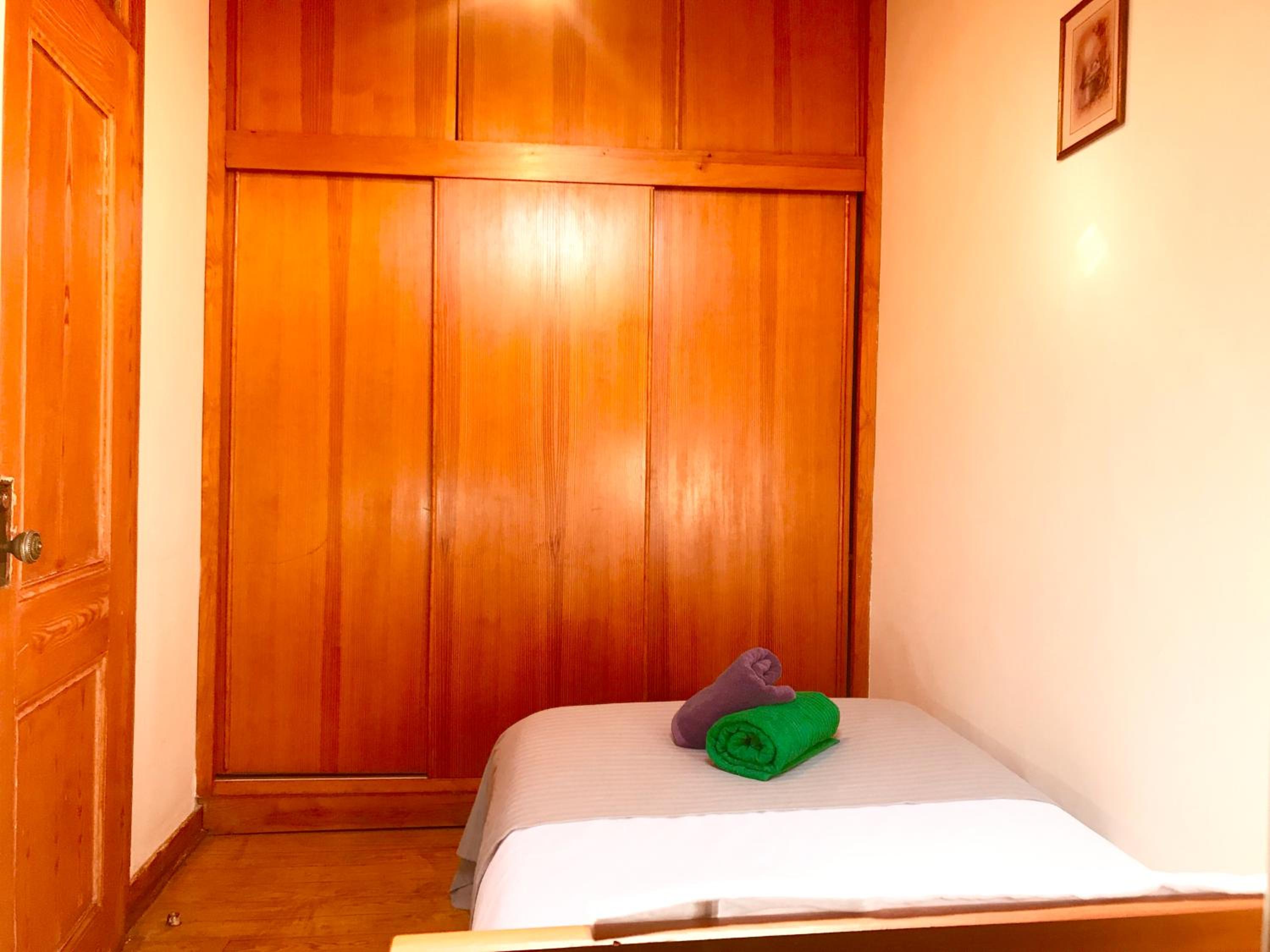 Three-Bedroom Apartment - Photo 40