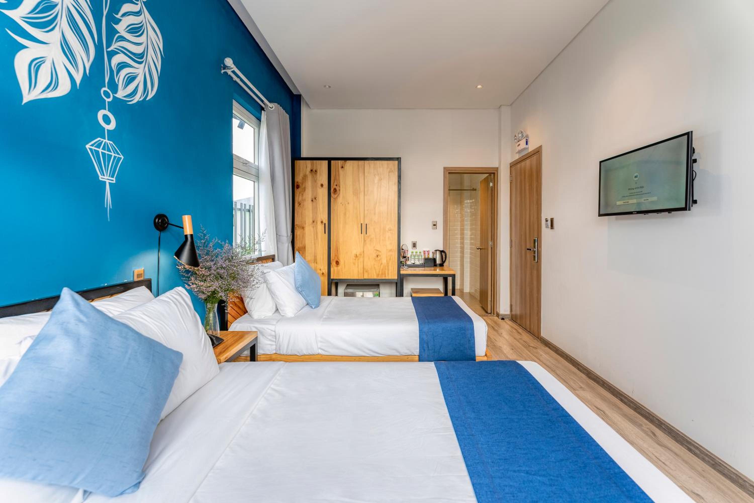 Deluxe Triple Room - Photo 8