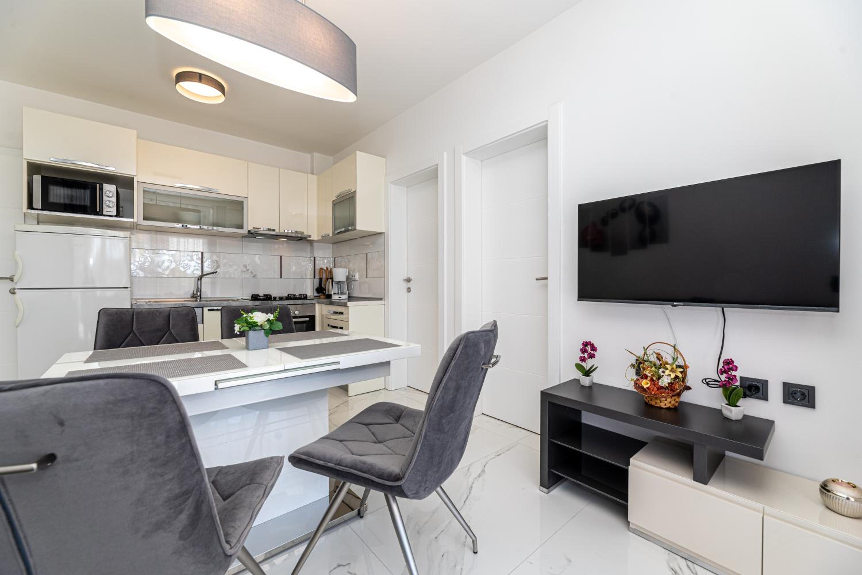 Three-Bedroom Apartment - Photo 16