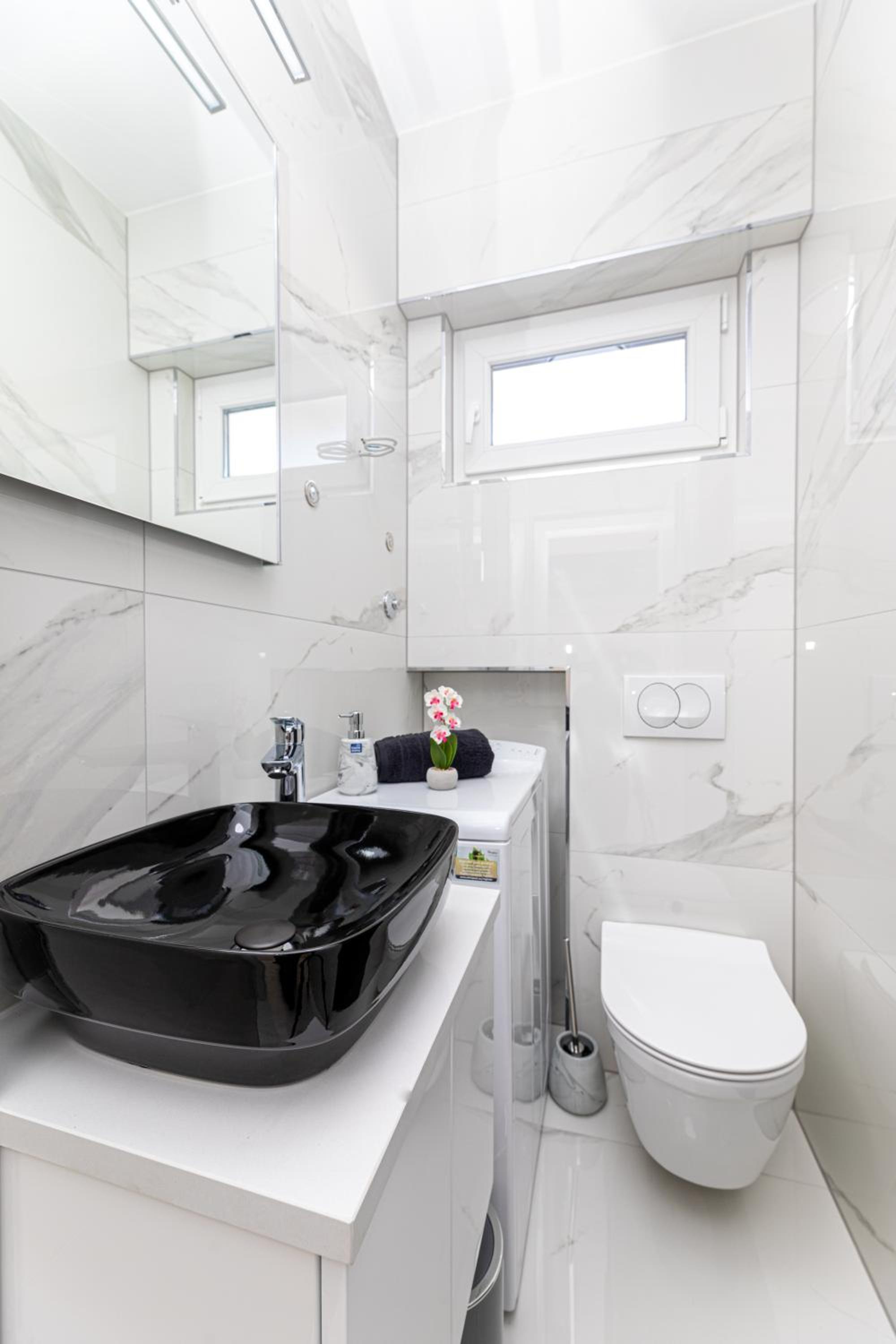 Three-Bedroom Apartment - Photo 19
