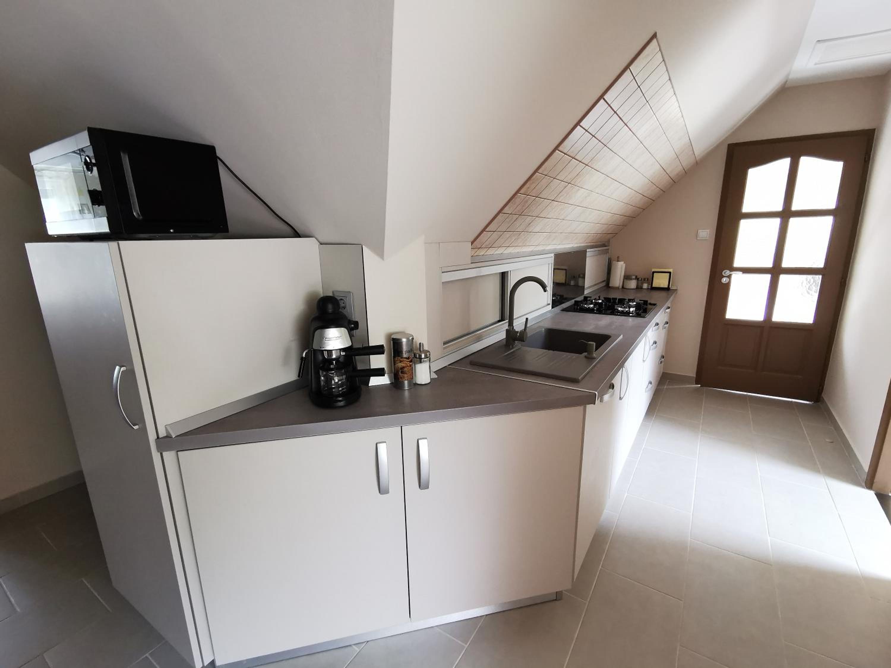 Three-Bedroom Apartment - Photo 31