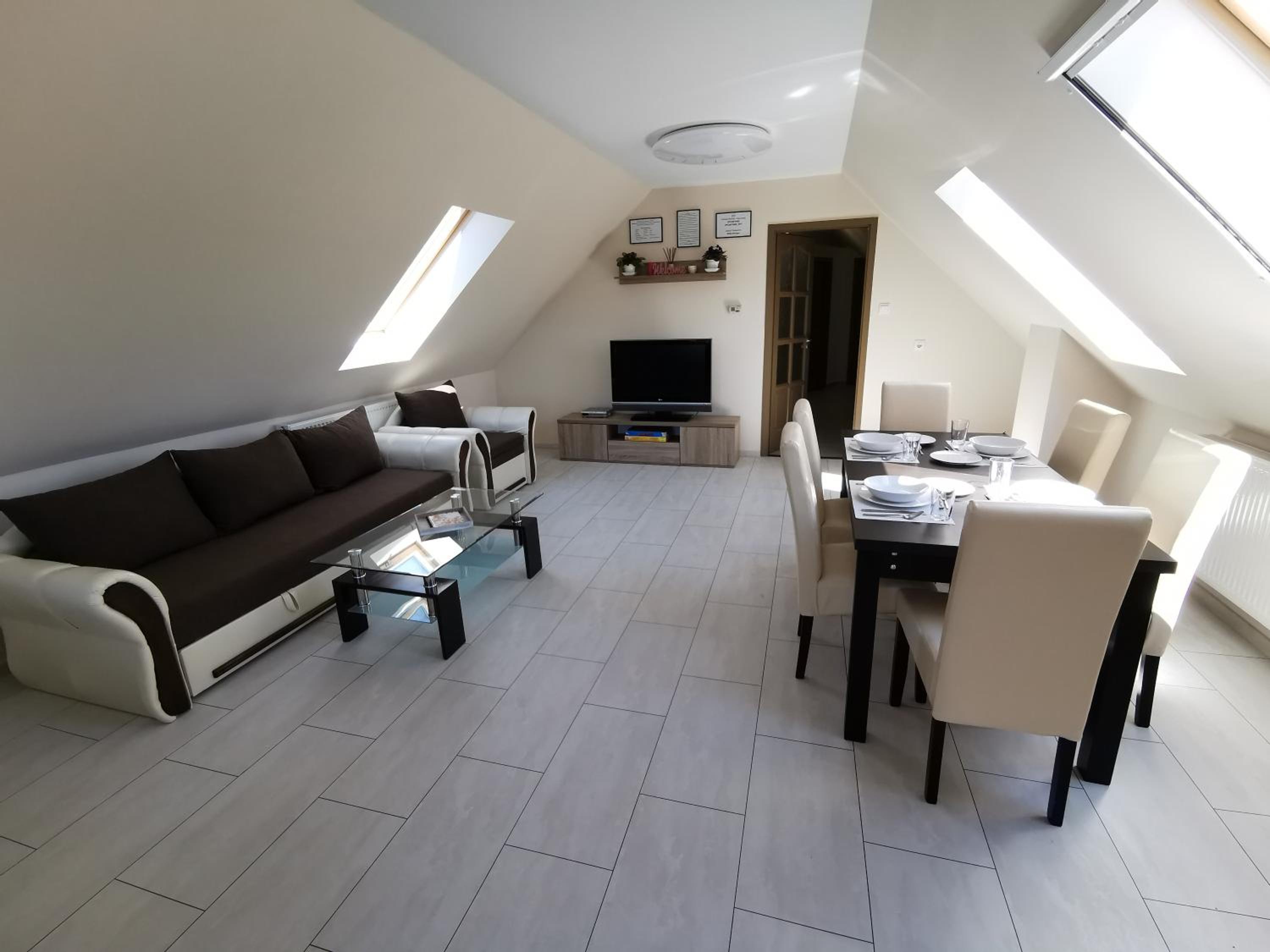 Three-Bedroom Apartment - Photo 18