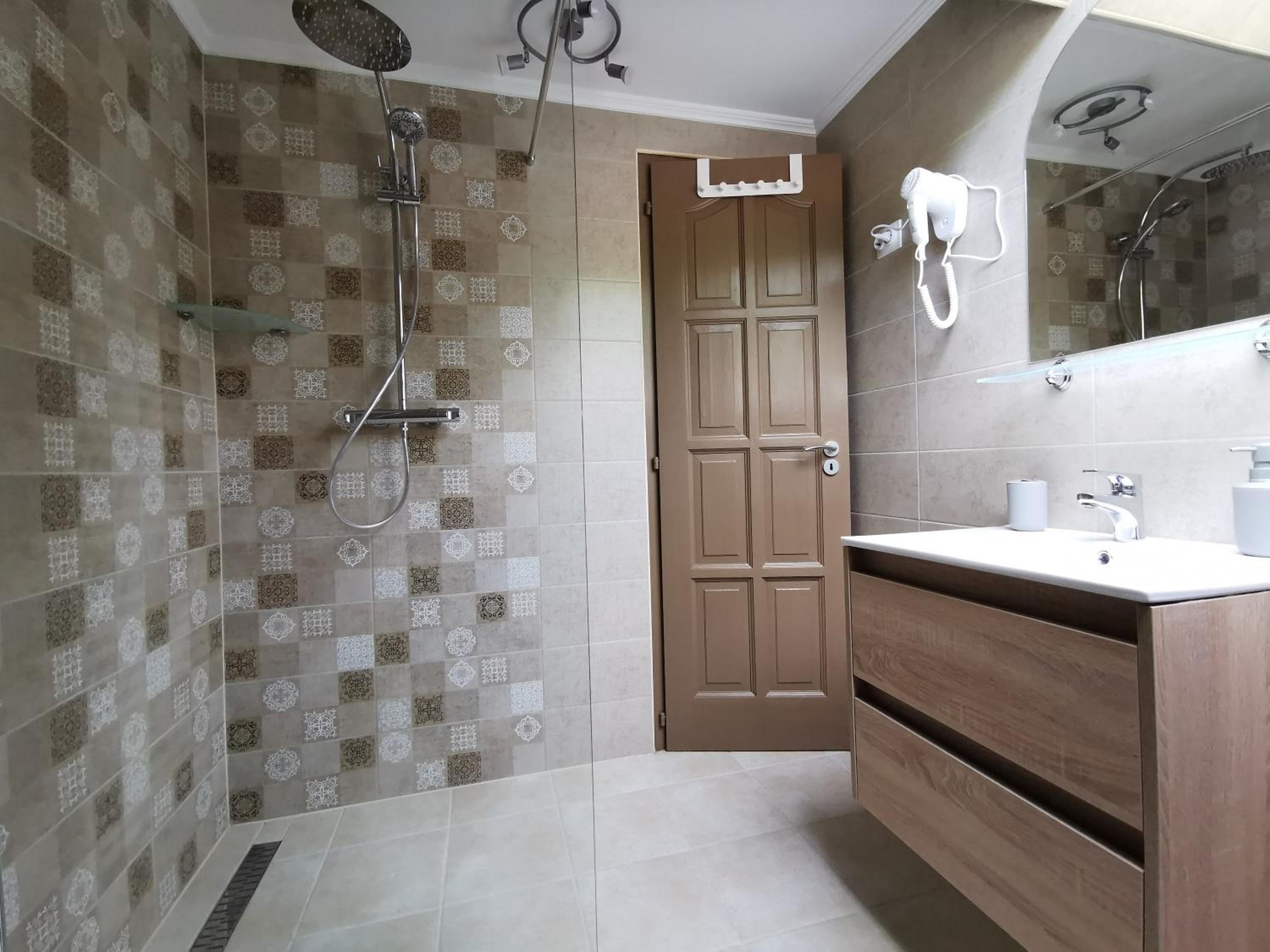 Three-Bedroom Apartment - Photo 11