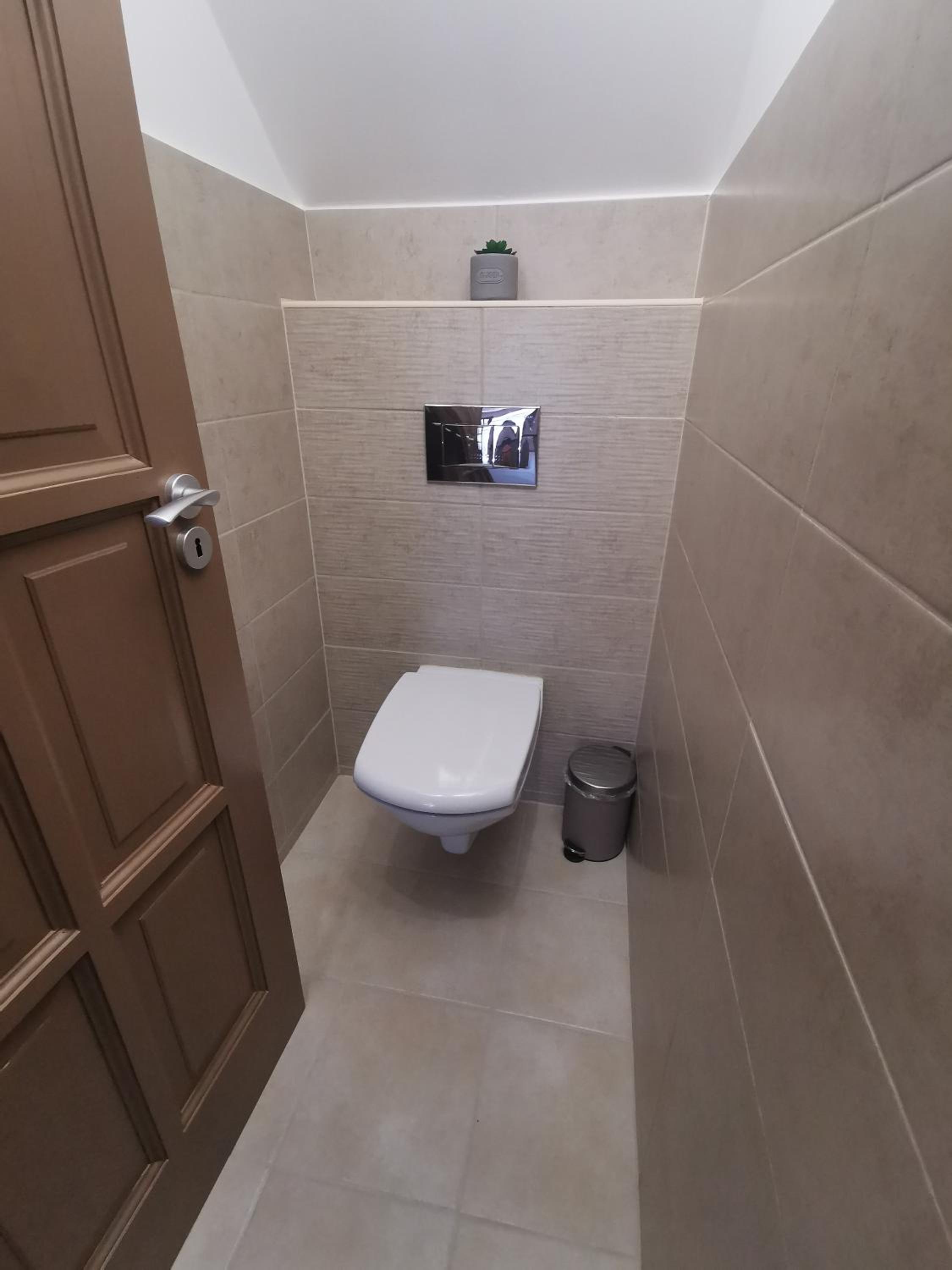 Three-Bedroom Apartment - Photo 44
