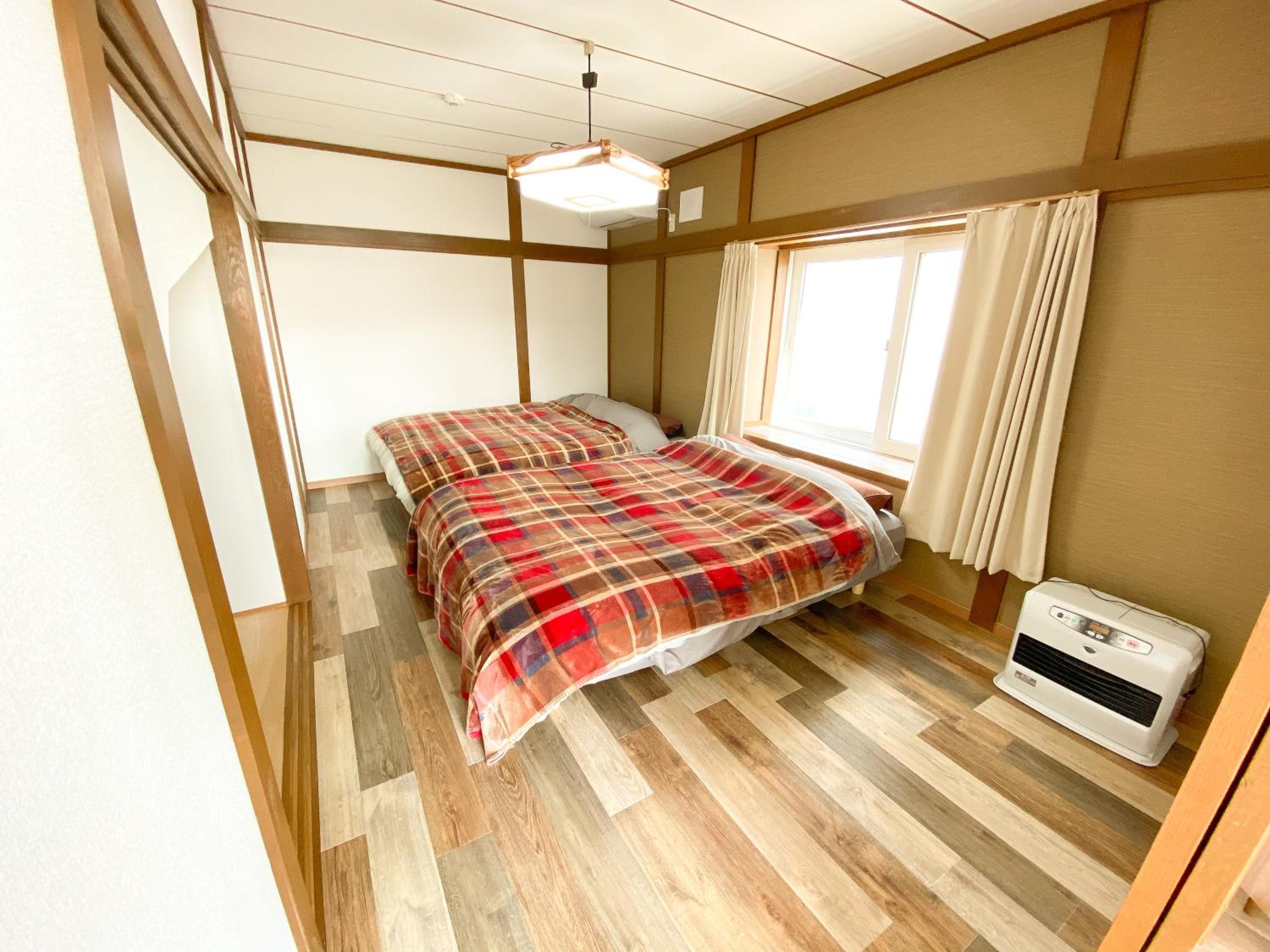 Four-Bedroom House - Photo 31