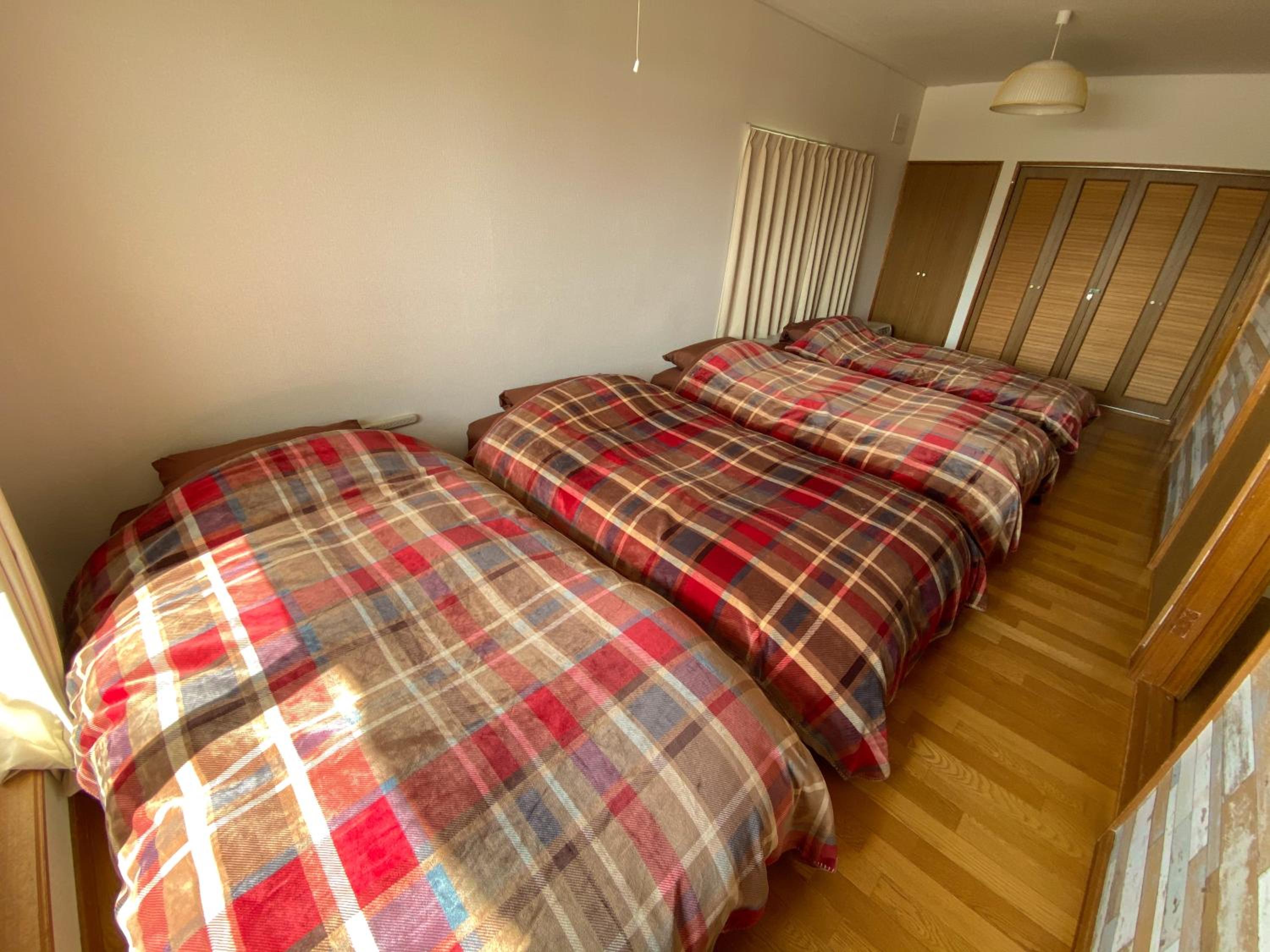 Four-Bedroom House - Photo 32