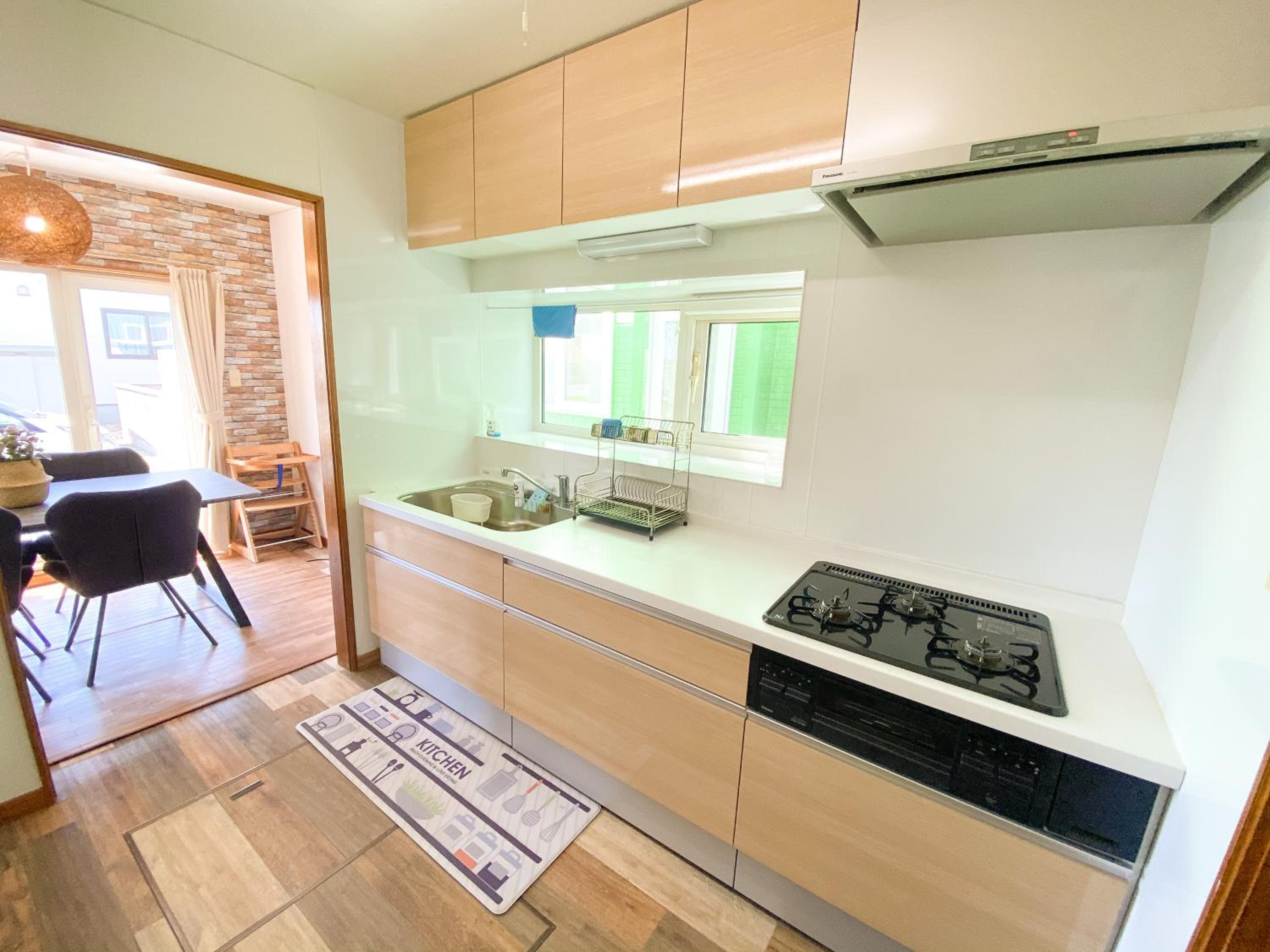 Four-Bedroom House - Photo 35