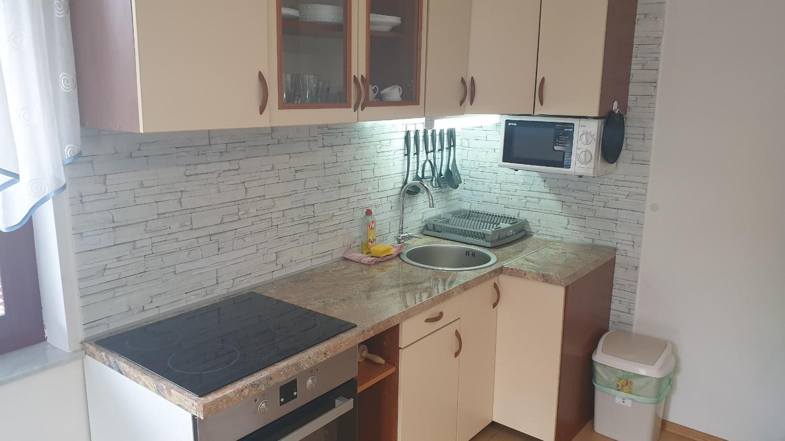 Apartment with Balcony - Photo 7