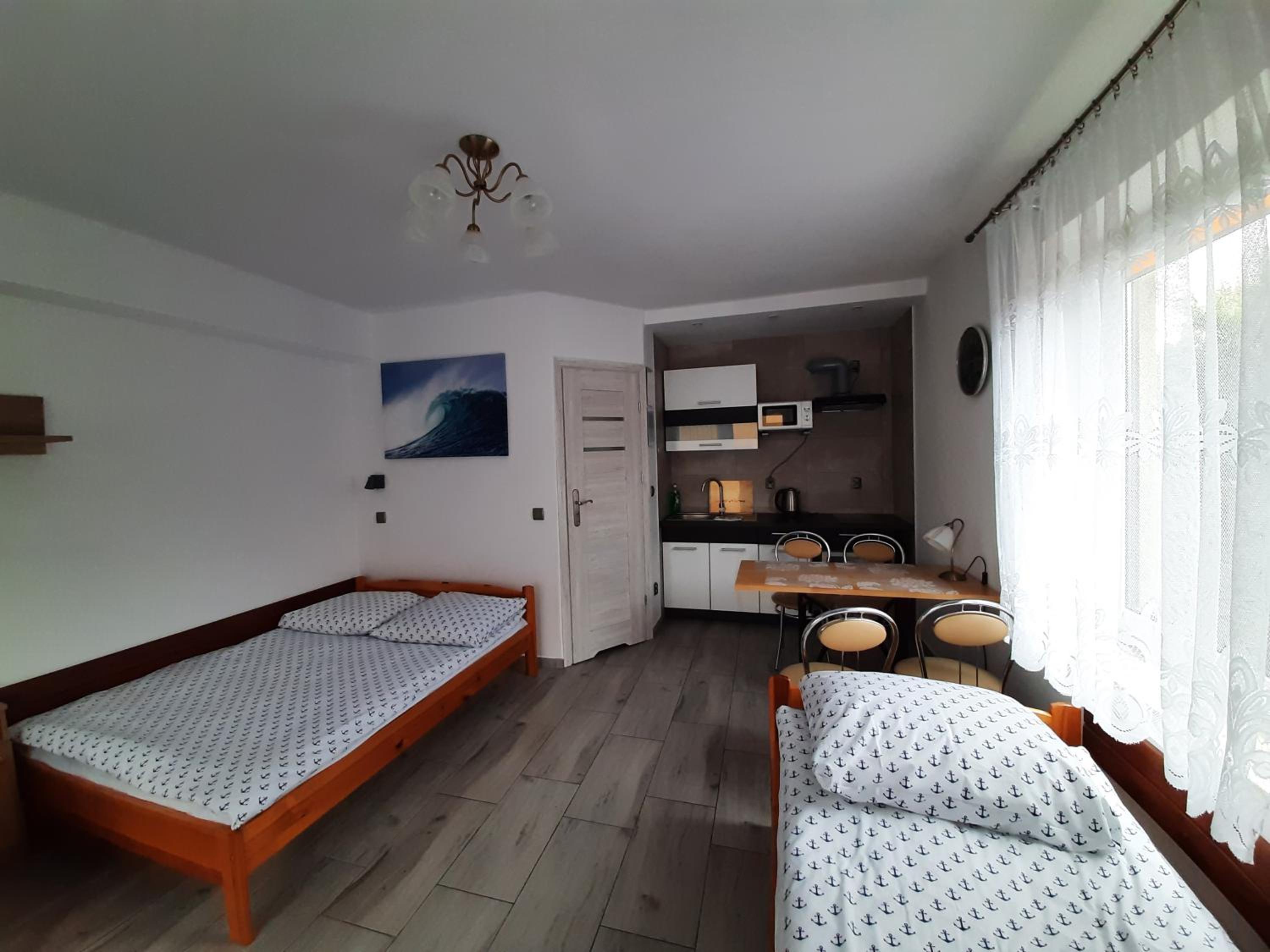 Quadruple Room with Private Bathroom photo 1