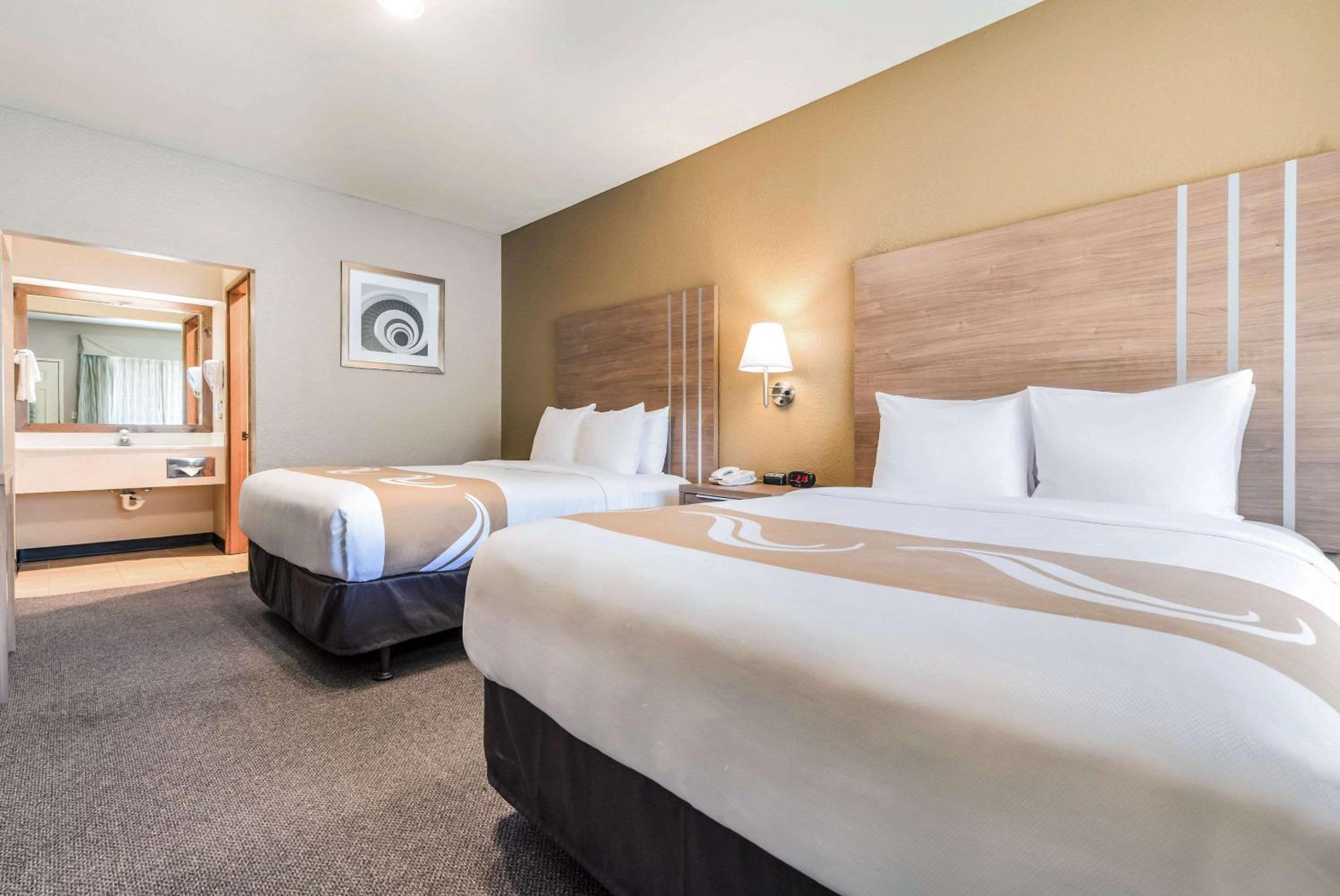Queen Room with Two Queen Beds - Pet Friendly/Non-Smoking - Photo 1