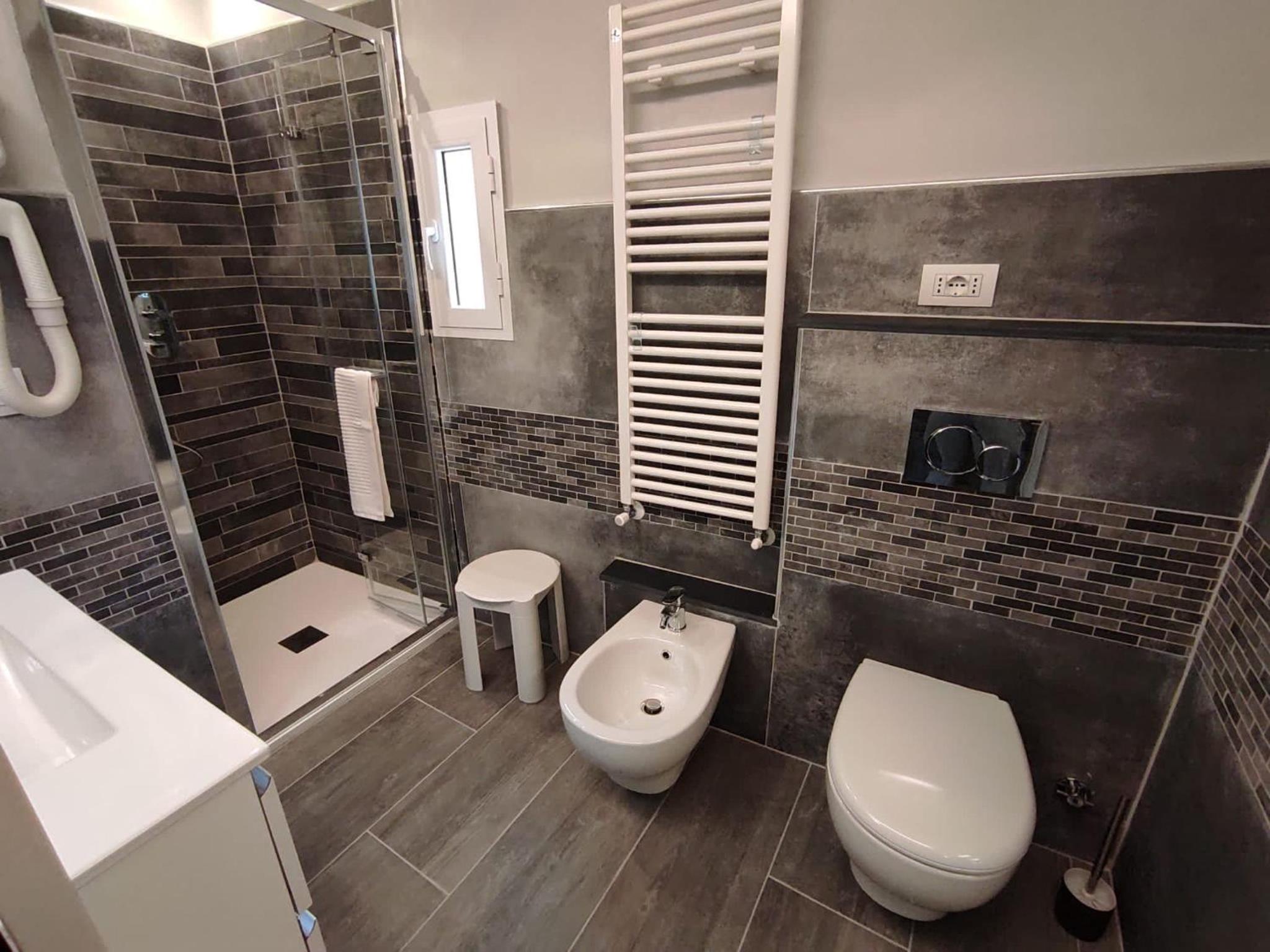 Three-Bedroom Apartment - Photo 42