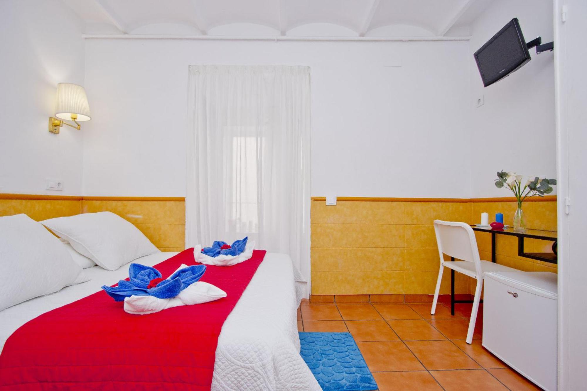 Habitación Doble Estándar o con Dos Camas Individuales.