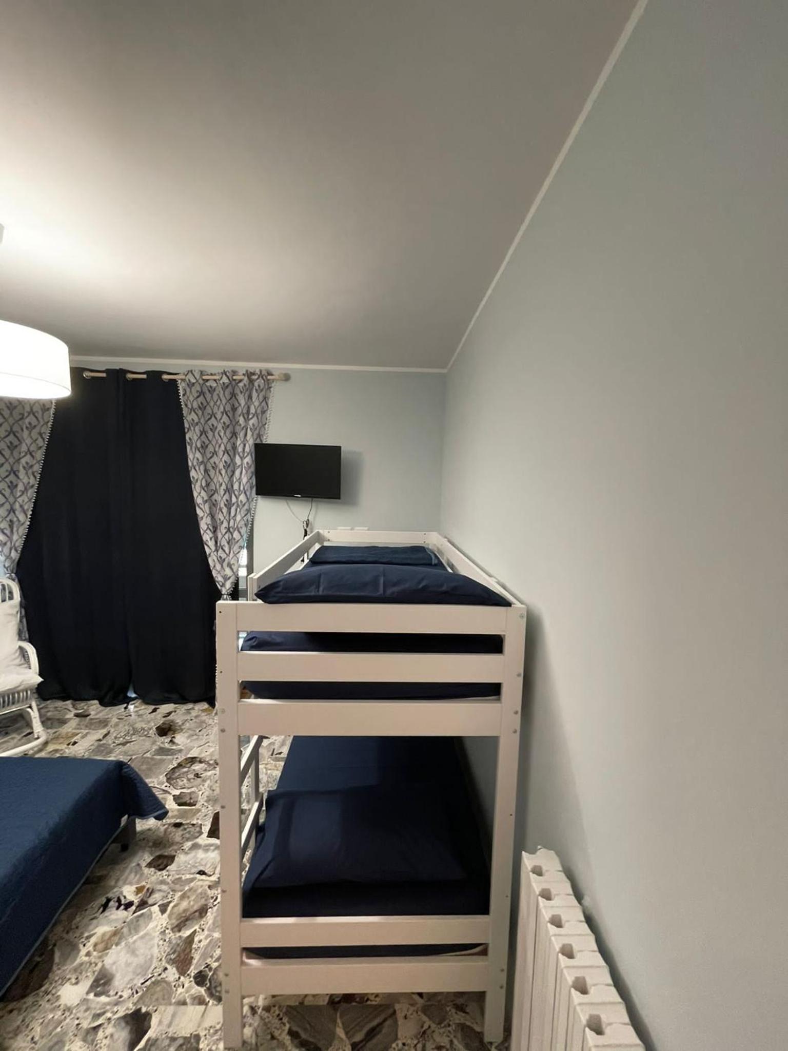Quadruple Room with Private Bathroom