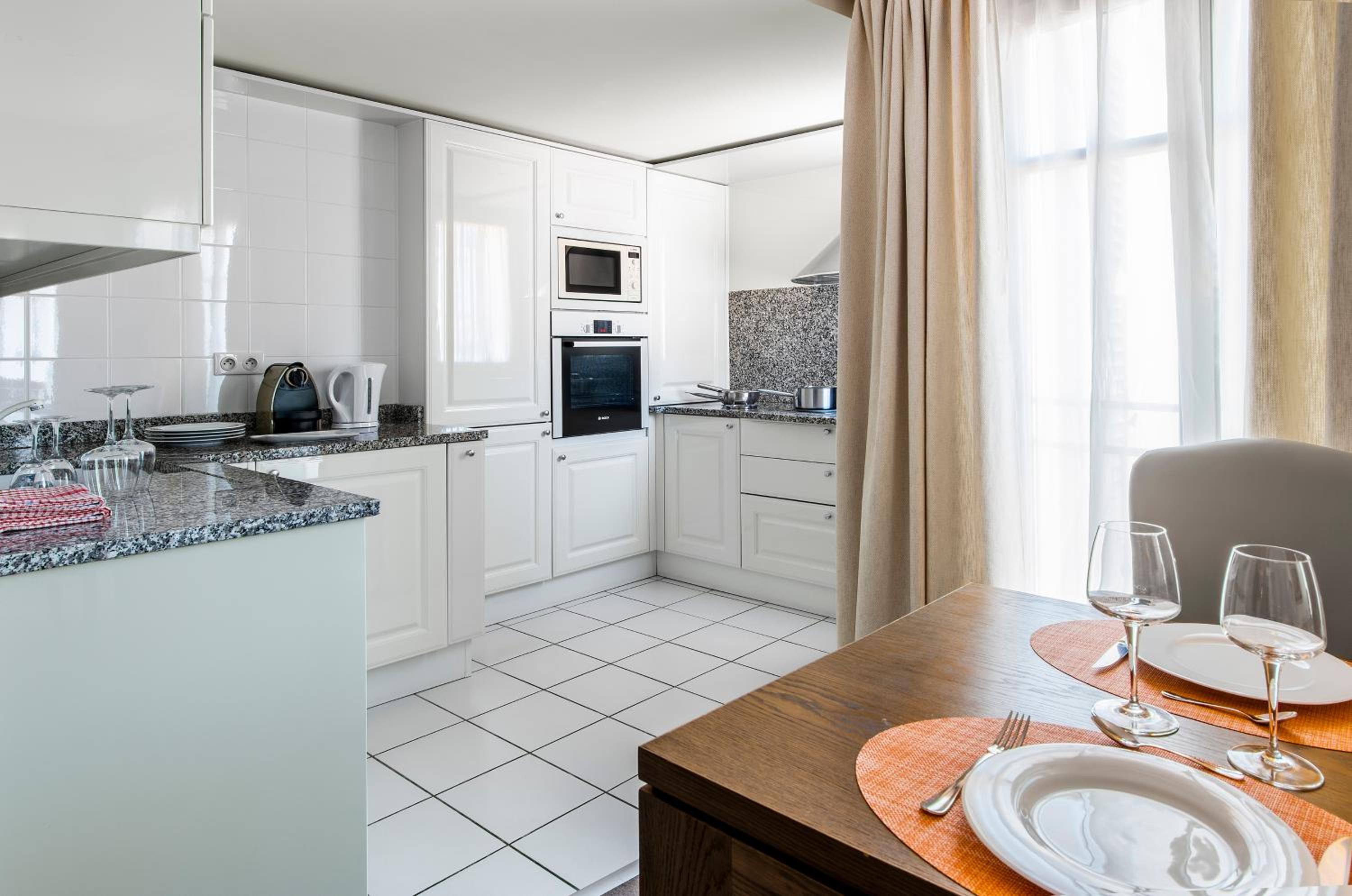 Three-Bedroom Apartment - Photo 4