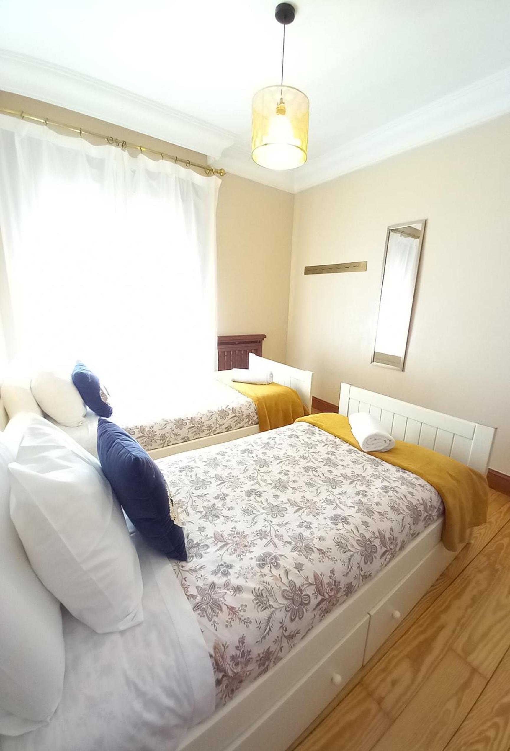 Three-Bedroom Apartment - Photo 11