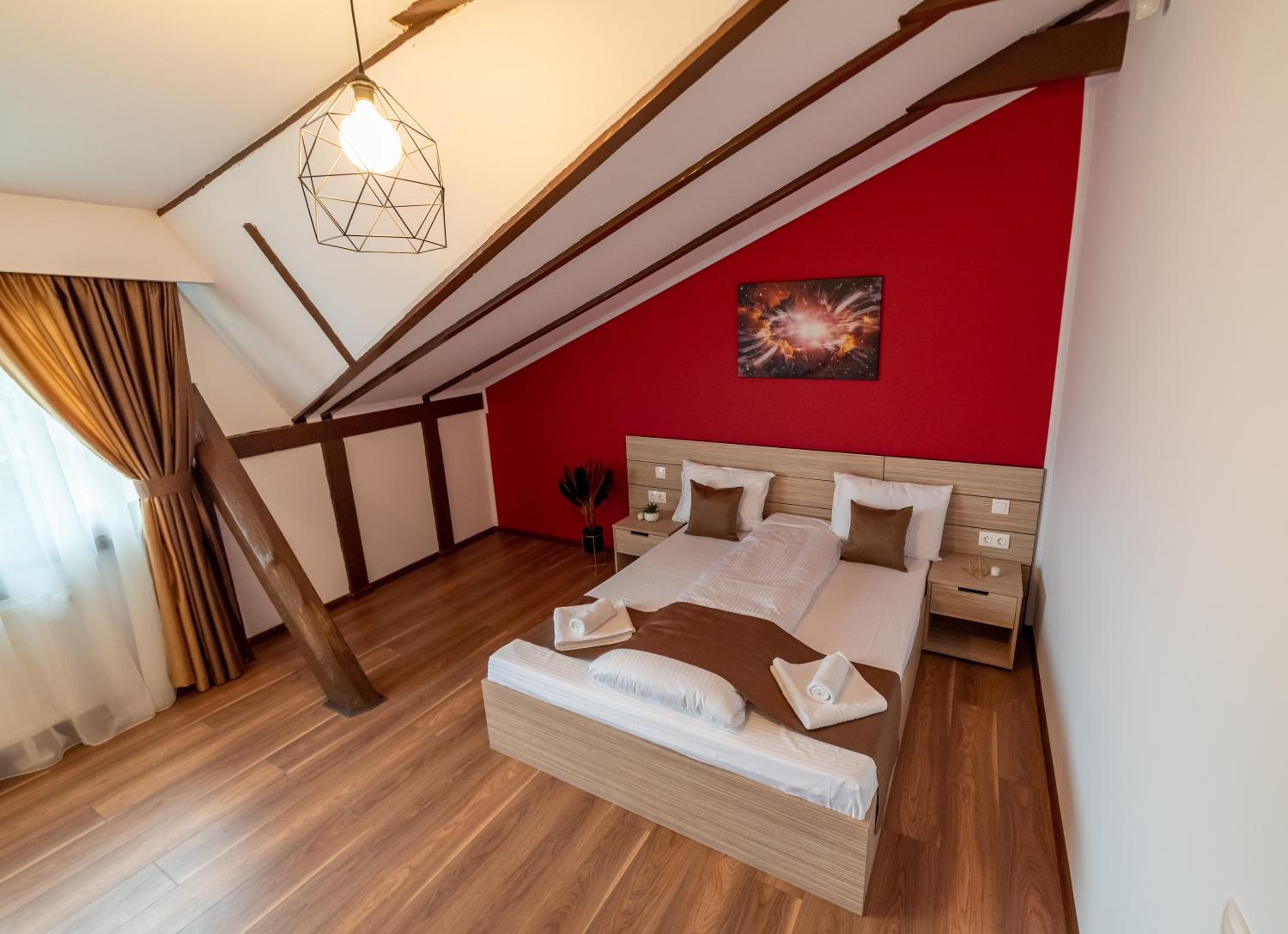 Deluxe Quadruple Room - Photo 8
