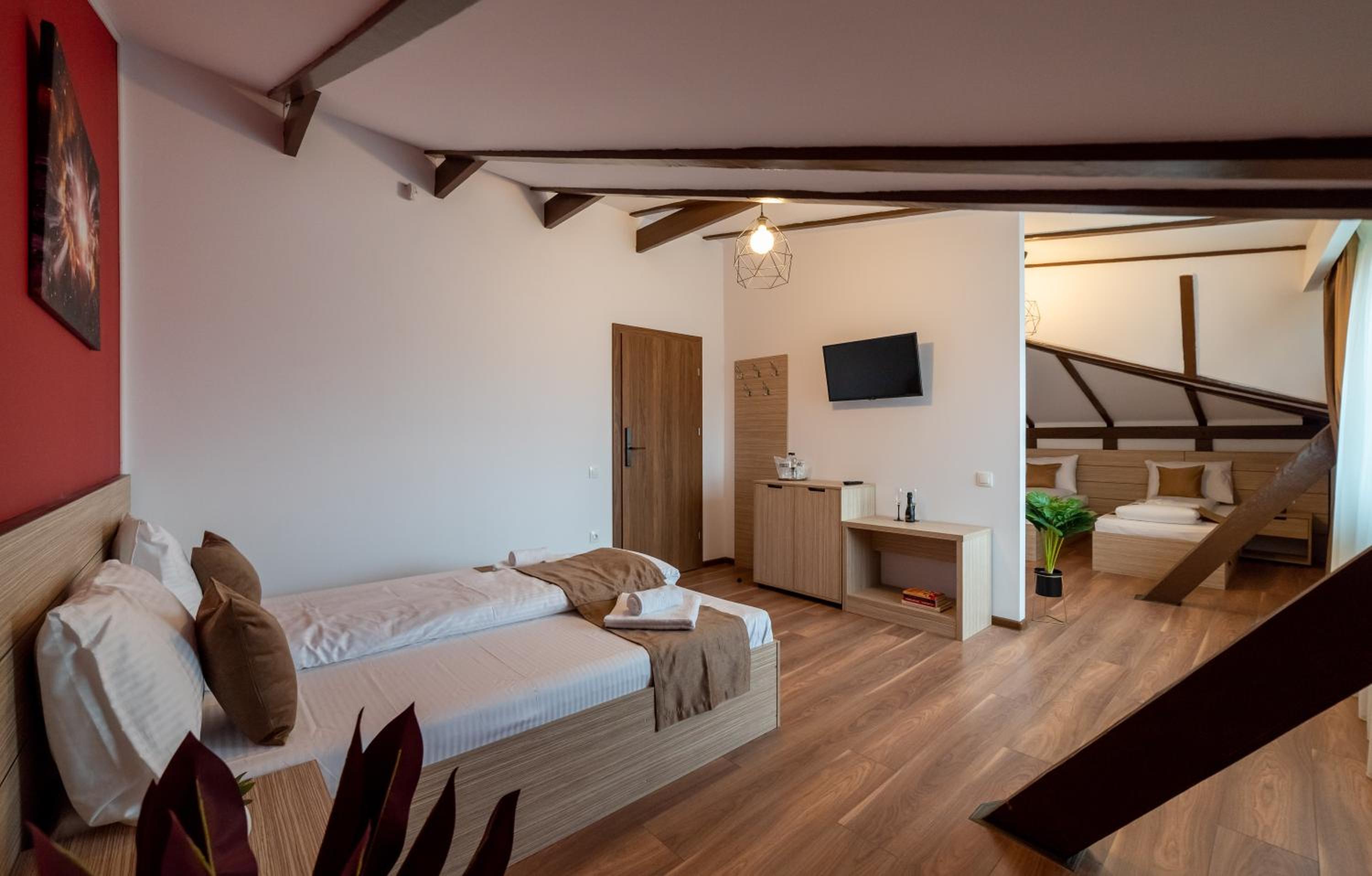 Deluxe Quadruple Room - Photo 7