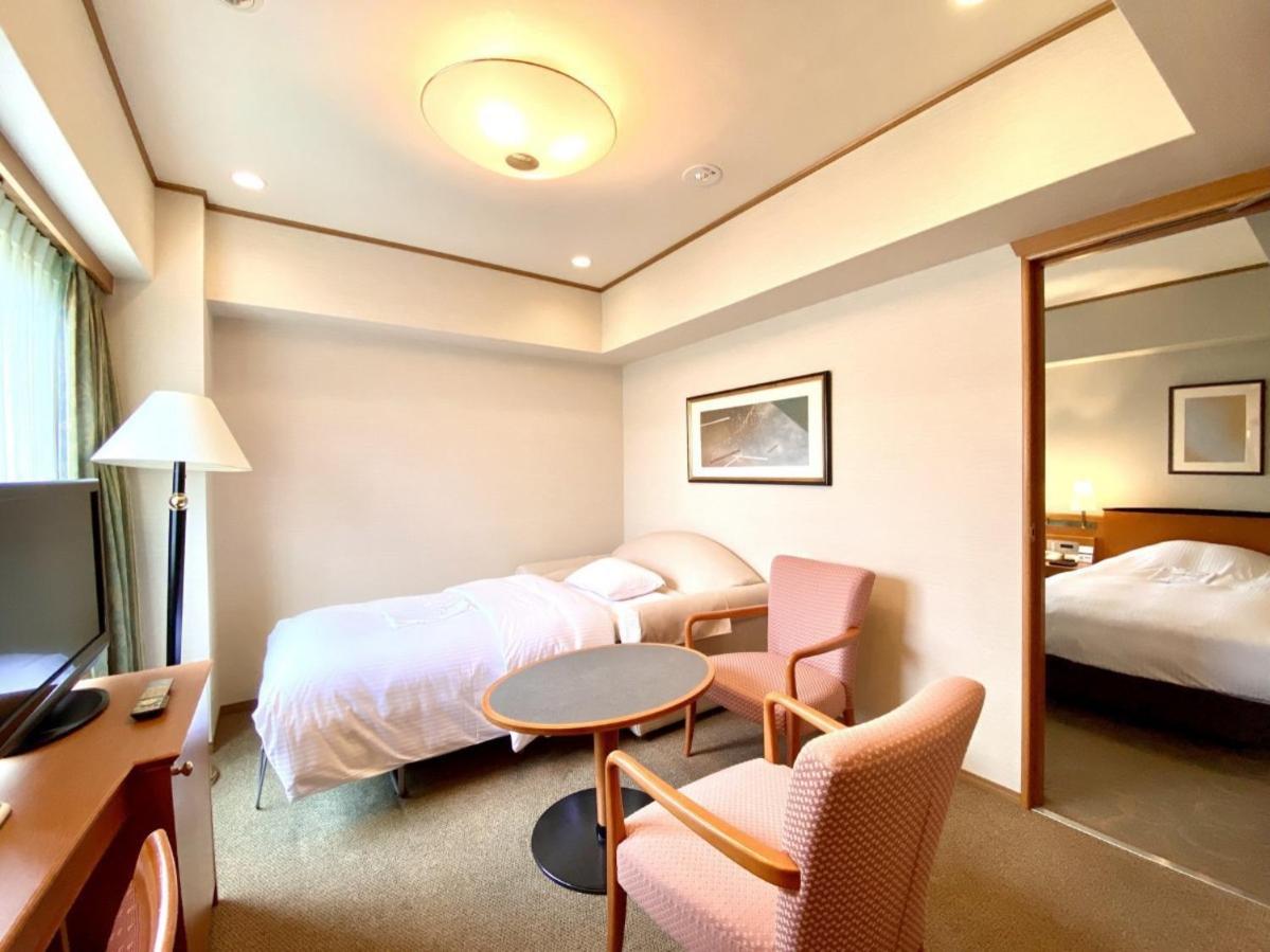 Deluxe Twin Room - Photo 6