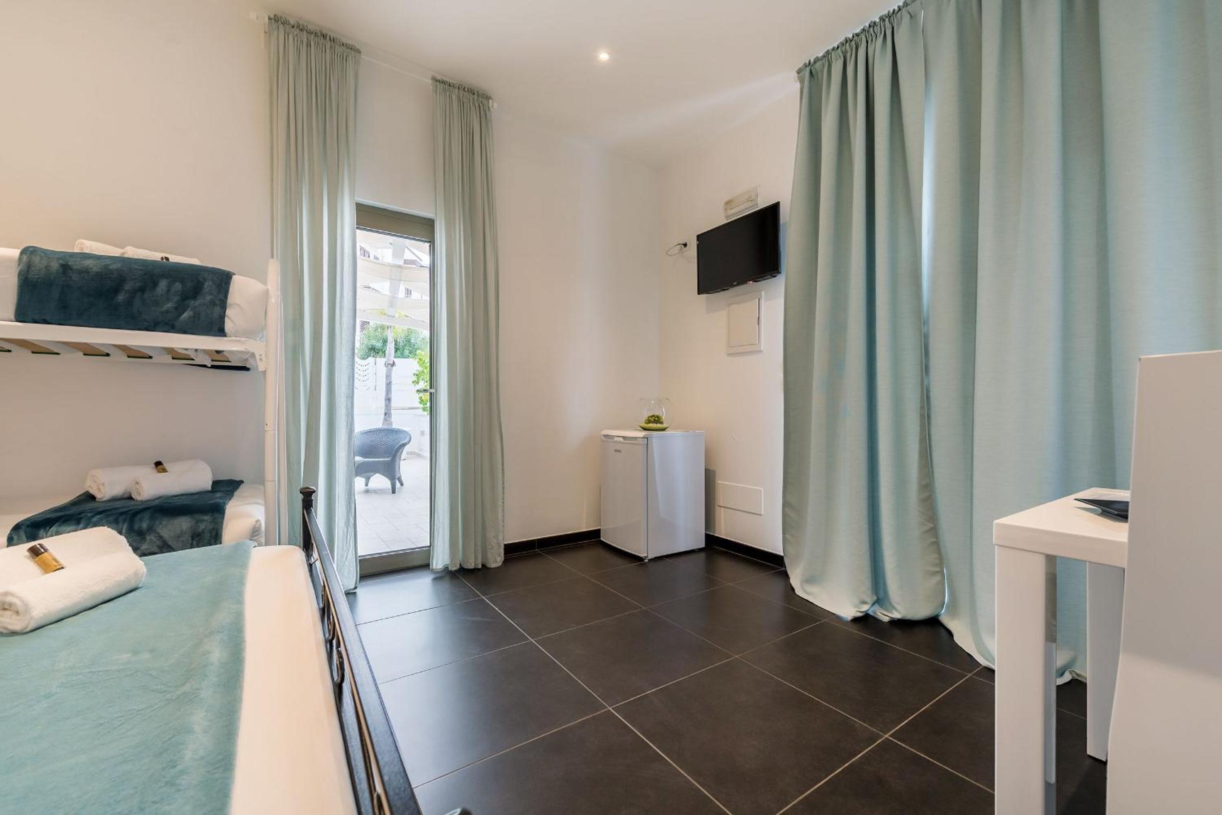 Comfort Quadruple Room - Photo 7
