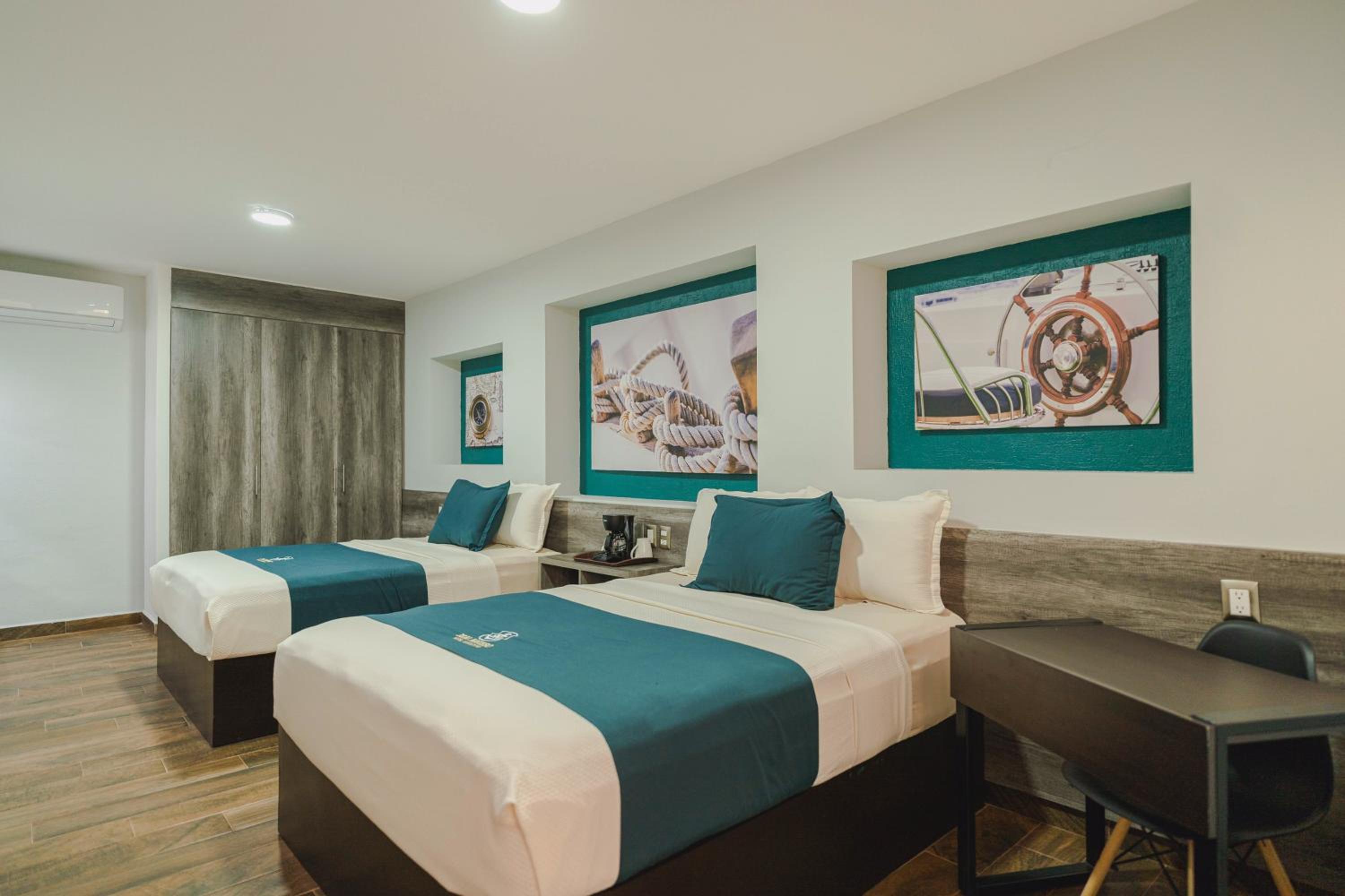 Deluxe Queen Room with Two Queen Beds - Photo 1