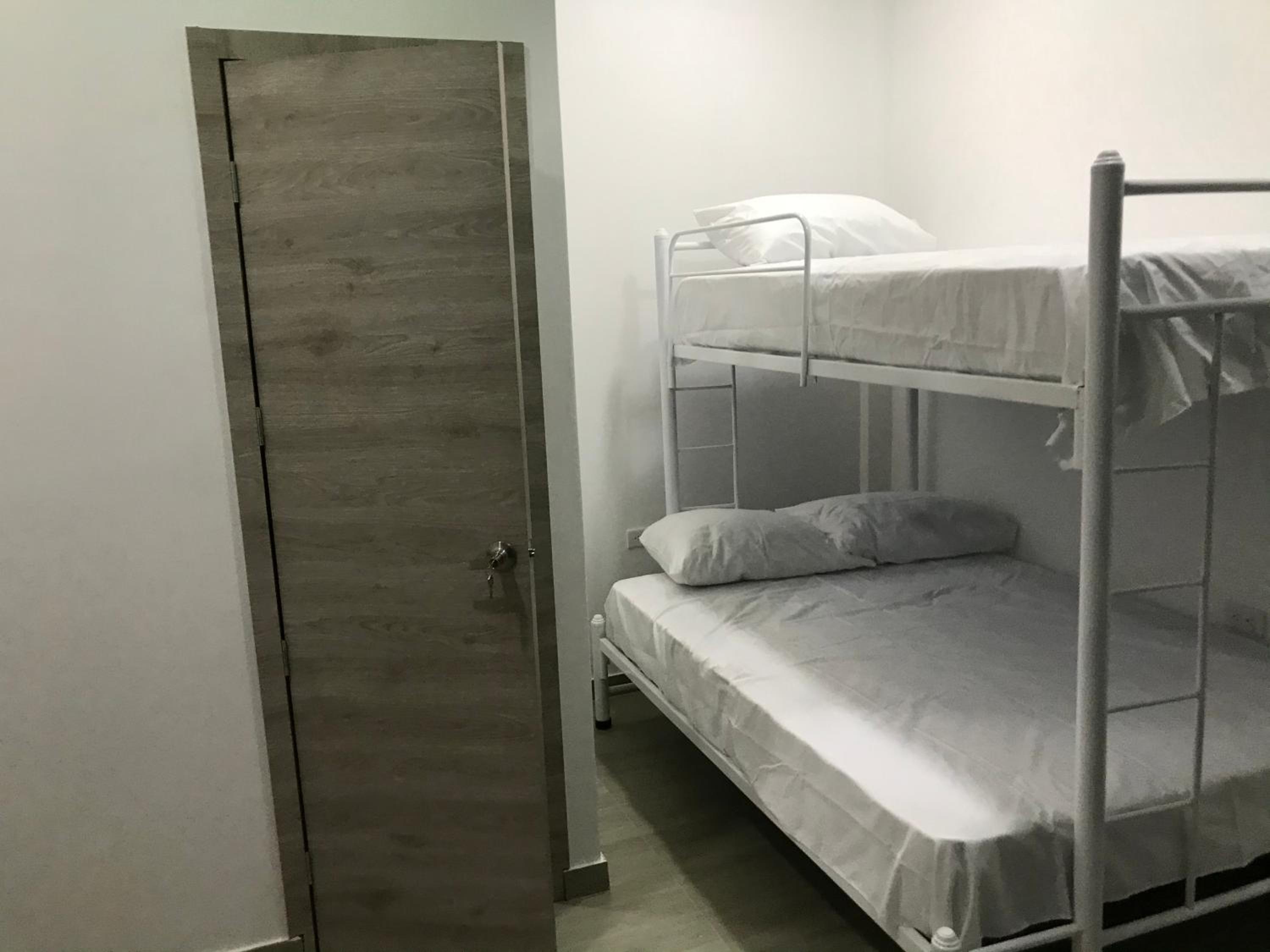Economy Triple Room photo 2