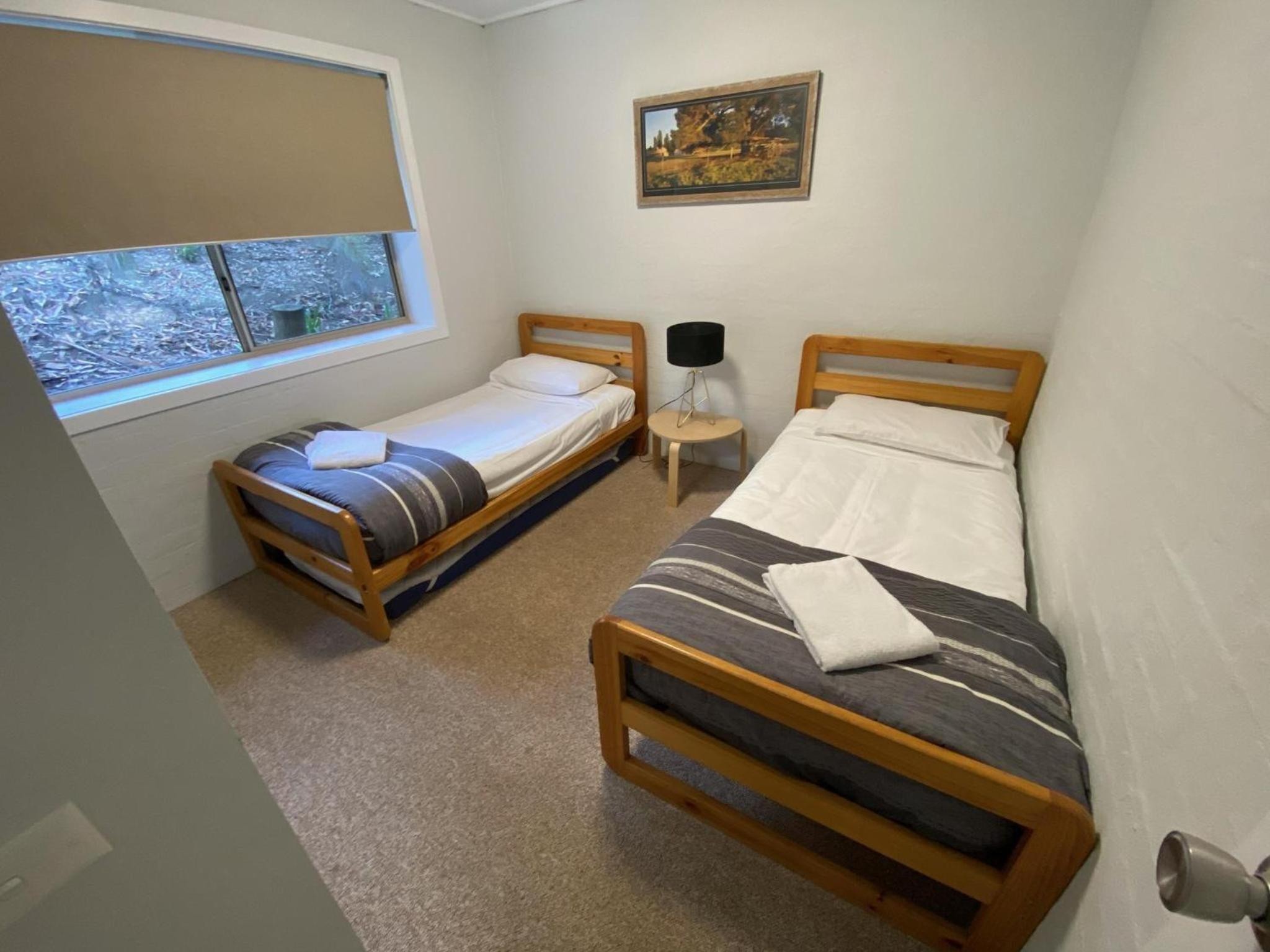 Superior Cottage with One Queen Bed and Two Single Beds (4 Guests)