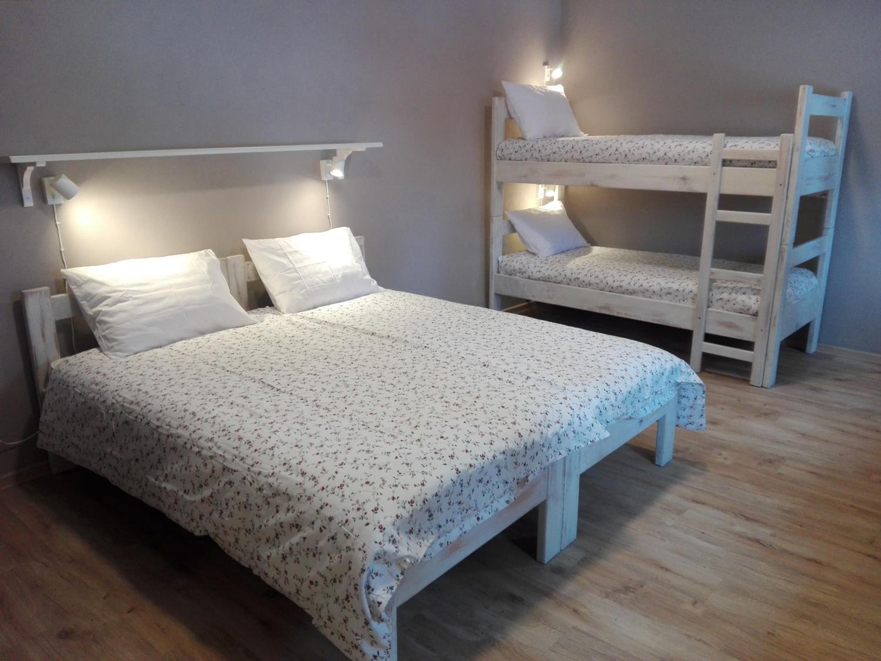 Quadruple Room with Private Bathroom - Photo 1