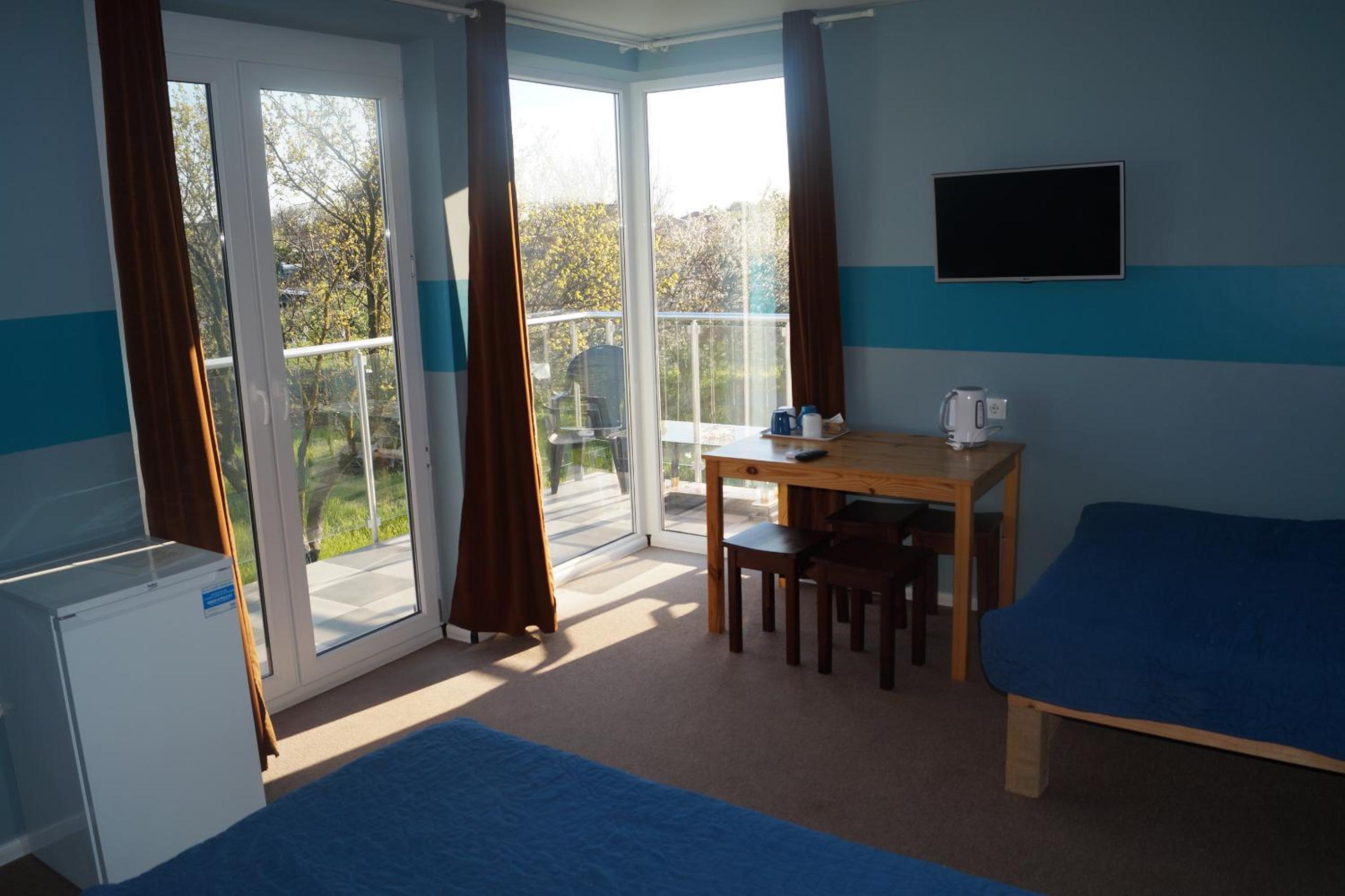 Quadruple Room with Balcony photo 1