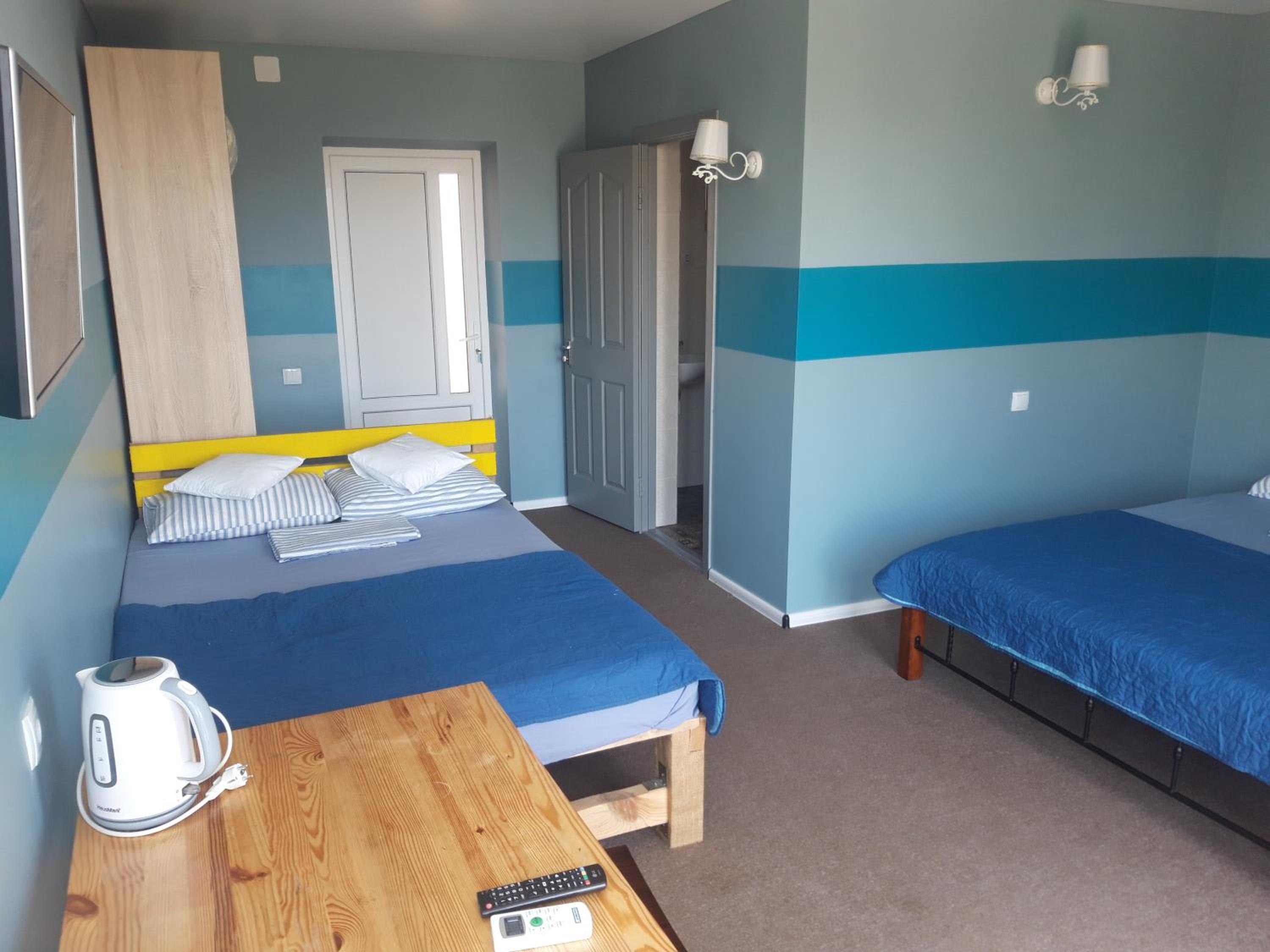 Quadruple Room with Balcony photo 3