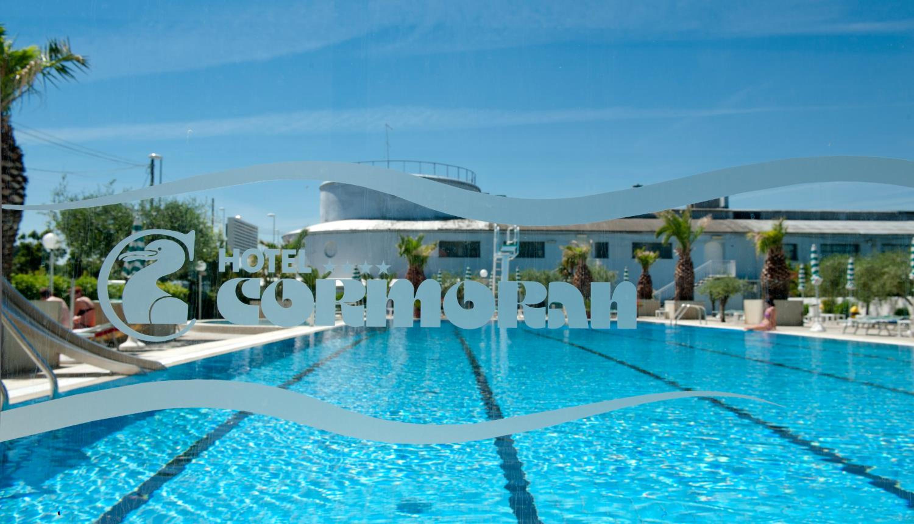 Family Room with Balcony and Pool View photo 3