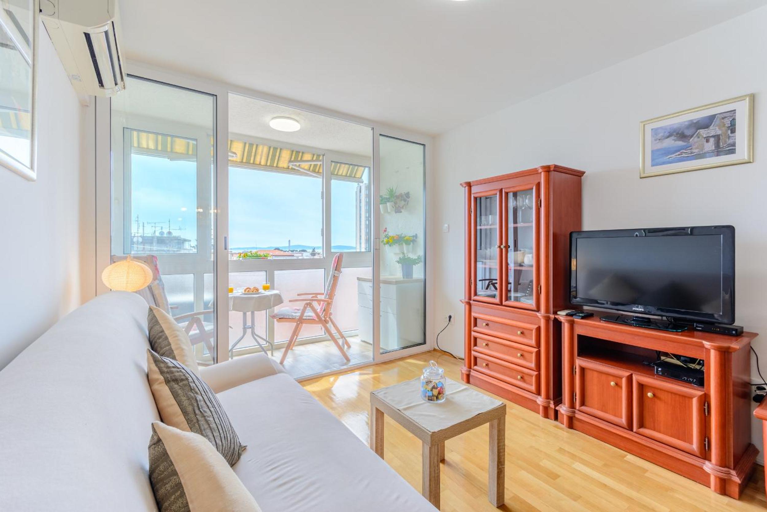 One Bedroom Apartment with Balcony and City View