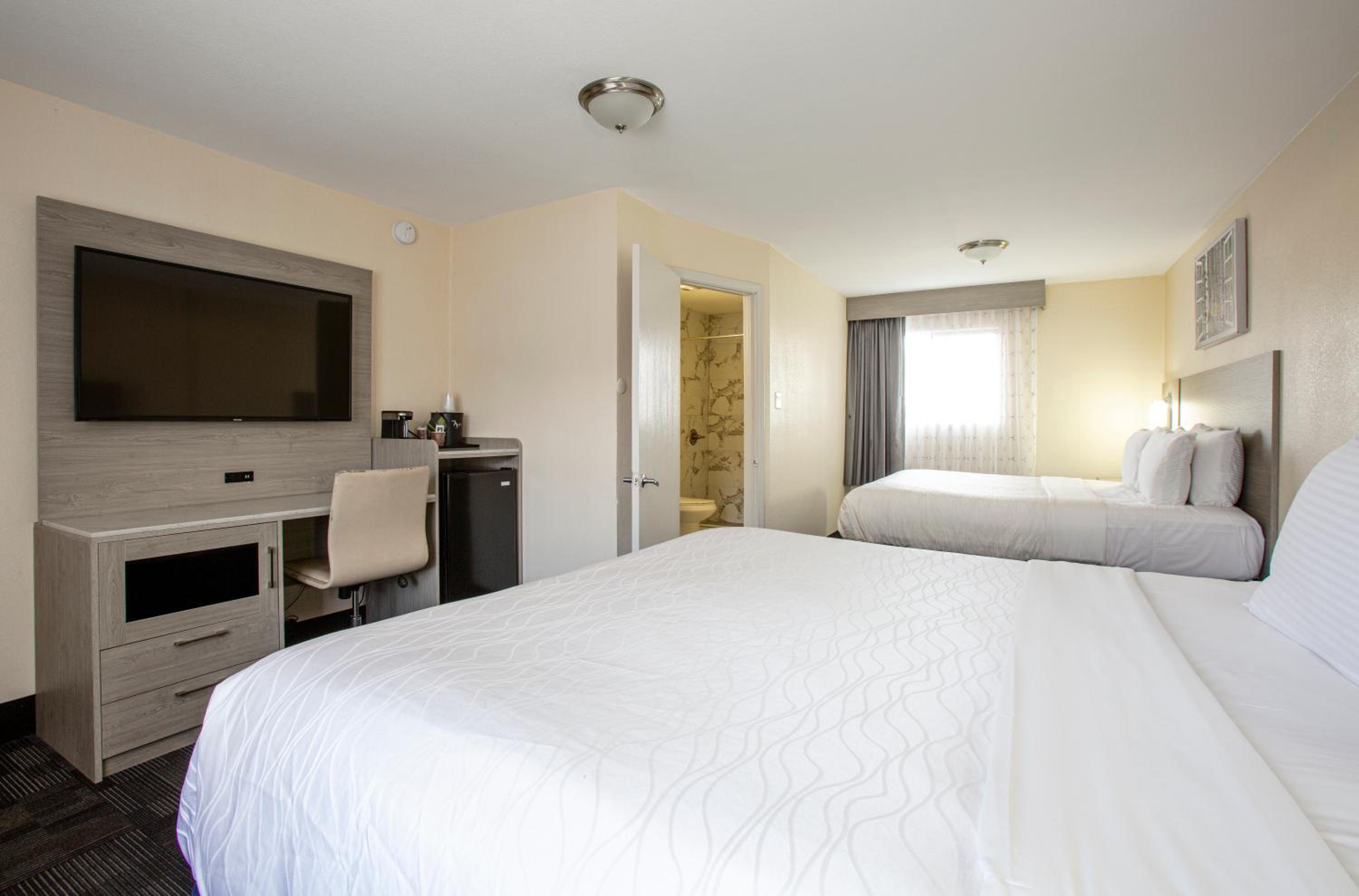 King Room with Two King Beds at Hotel Aspen Flagstaff/ Grand Canyon InnSuites in Flagstaff