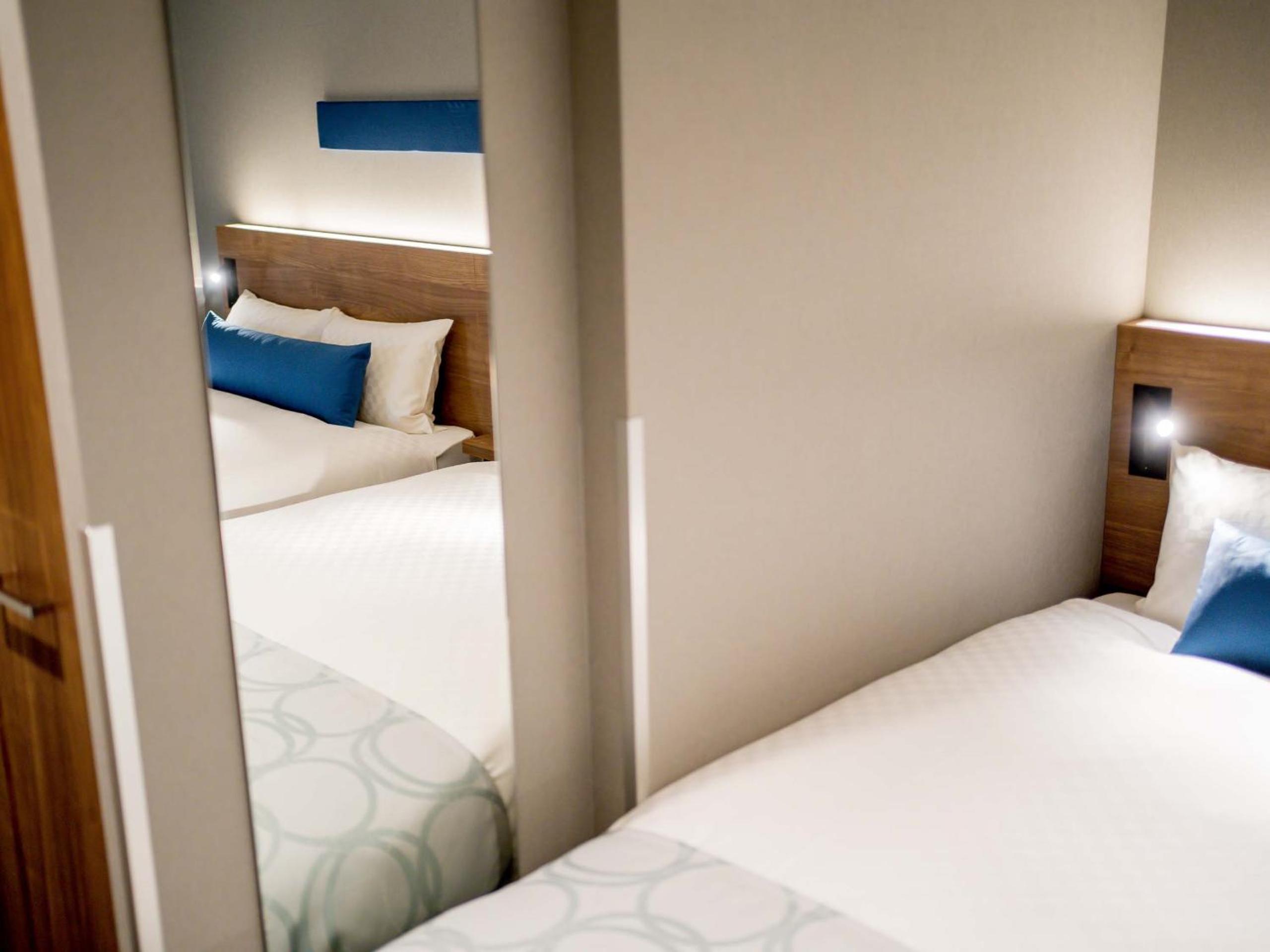 Standard Quadruple Room - Photo 10