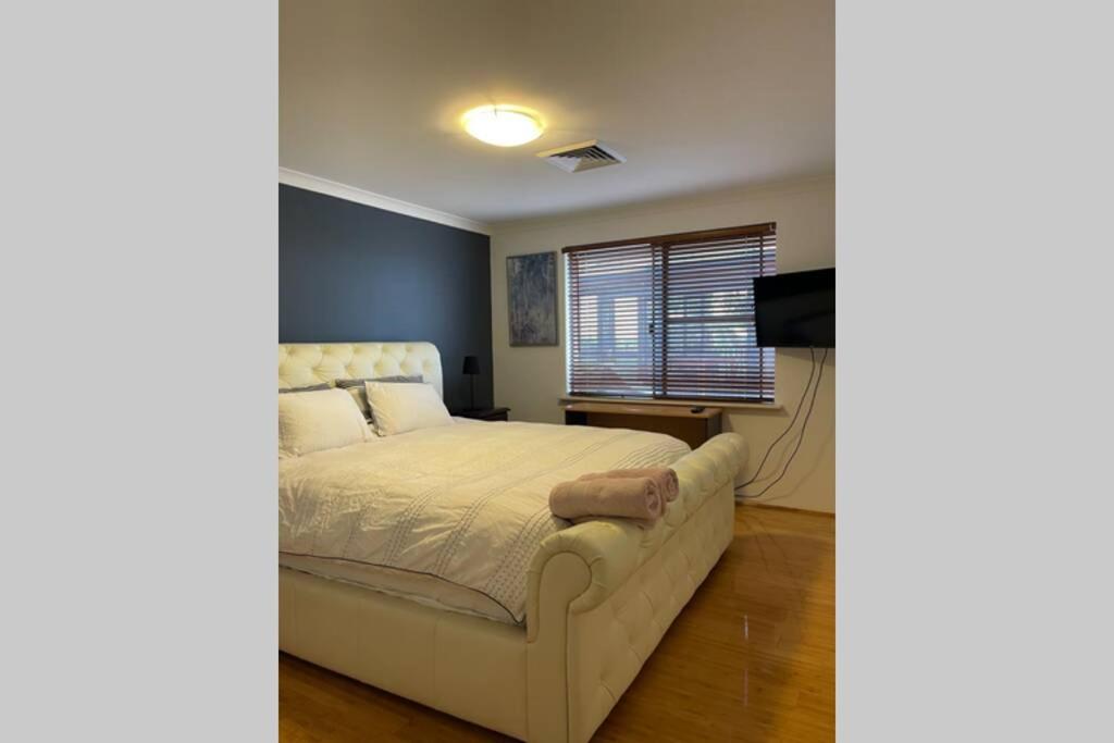Three-Bedroom Apartment - Photo 19