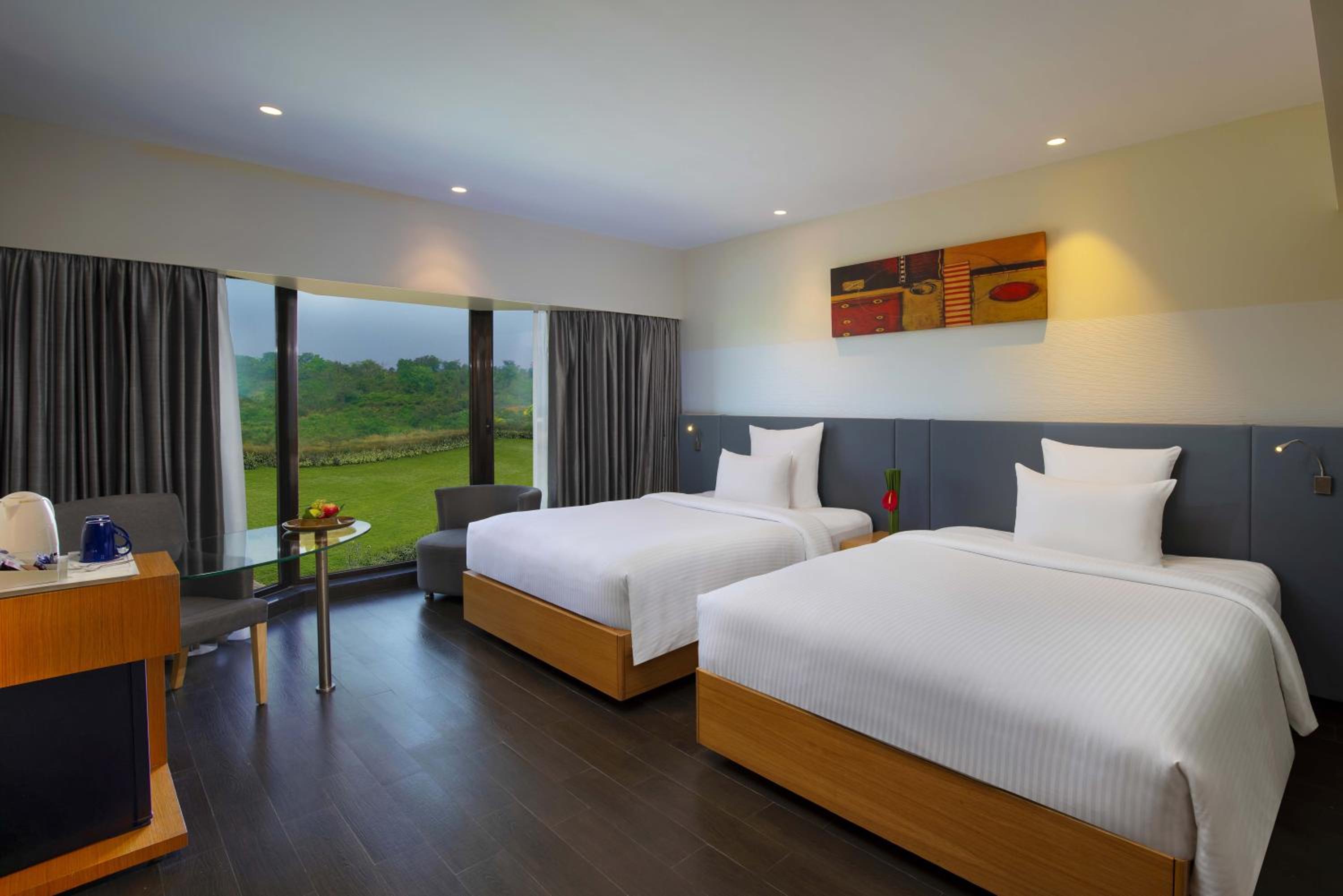 Classic Family Room with Two Queen Beds with Complimentary one free ticket for Trampoline Park at Imagicaa per room per stay and 20% discount on Food and Beverage - Photo 2