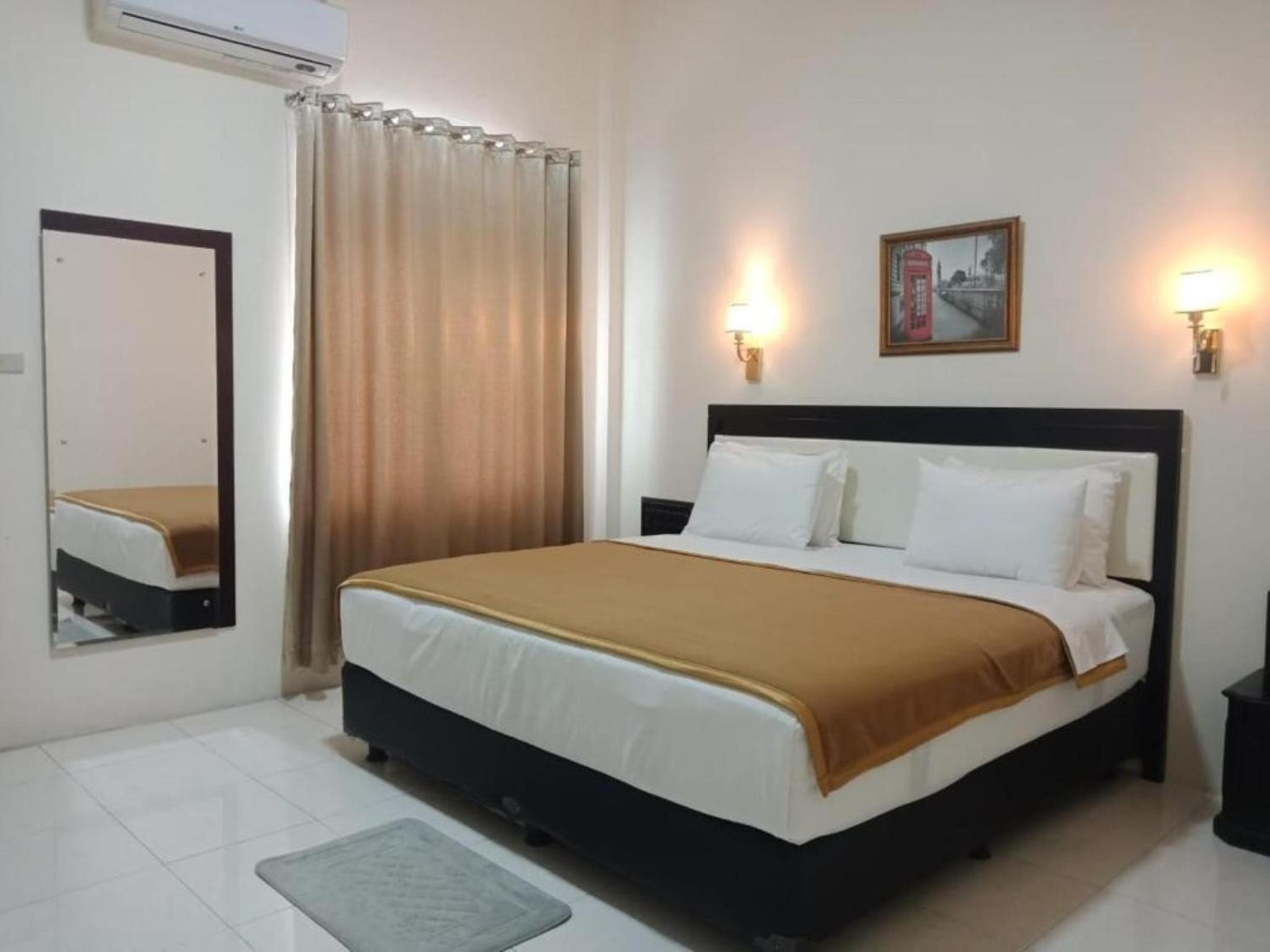 Deluxe Room - Photo 6