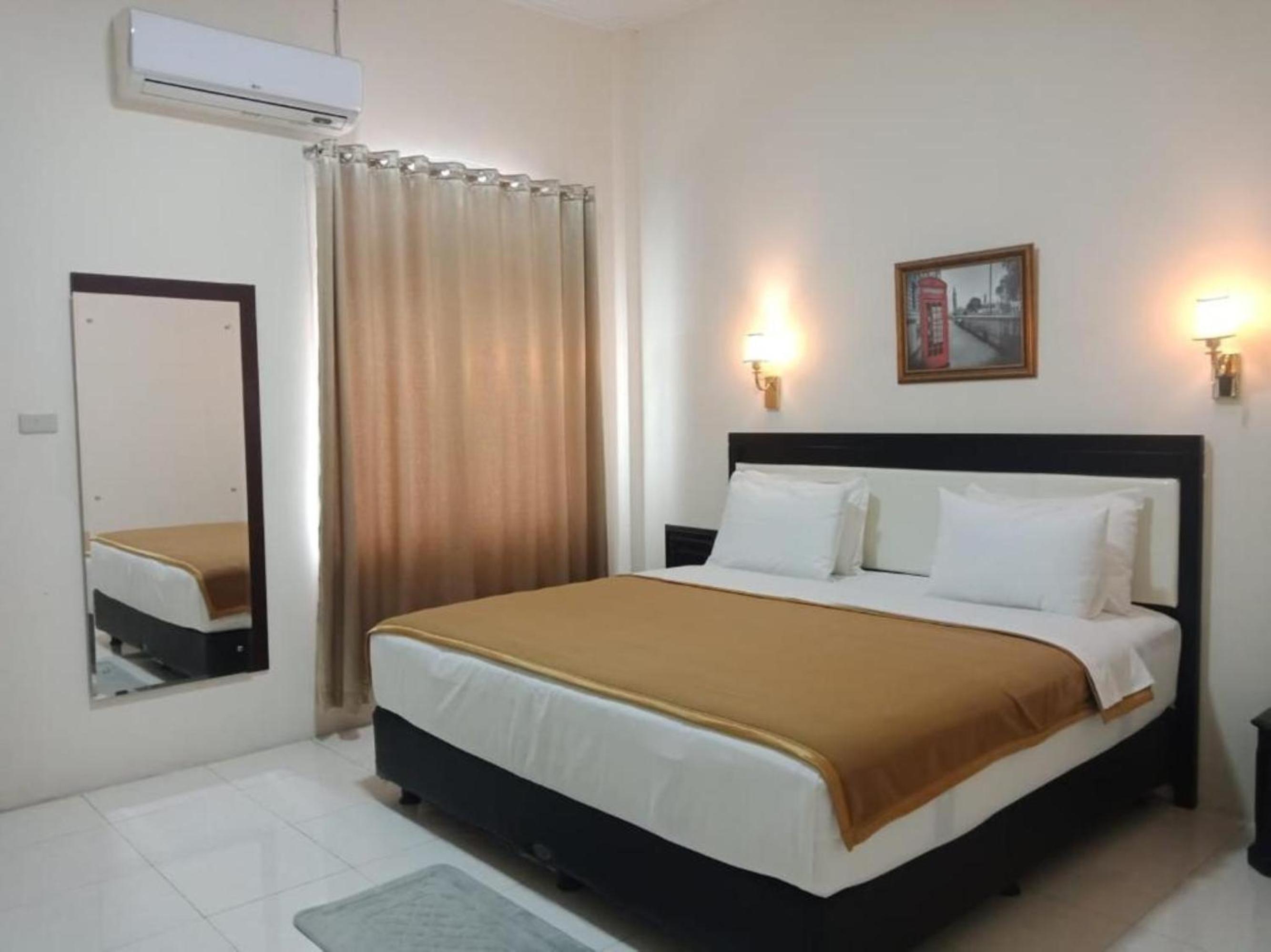 Deluxe Room - Photo 5