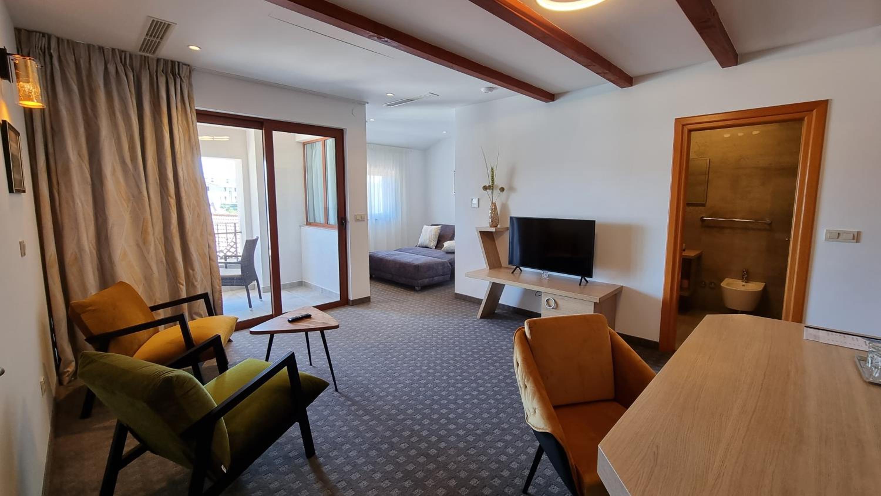 Deluxe Suite with Balcony and Sea View