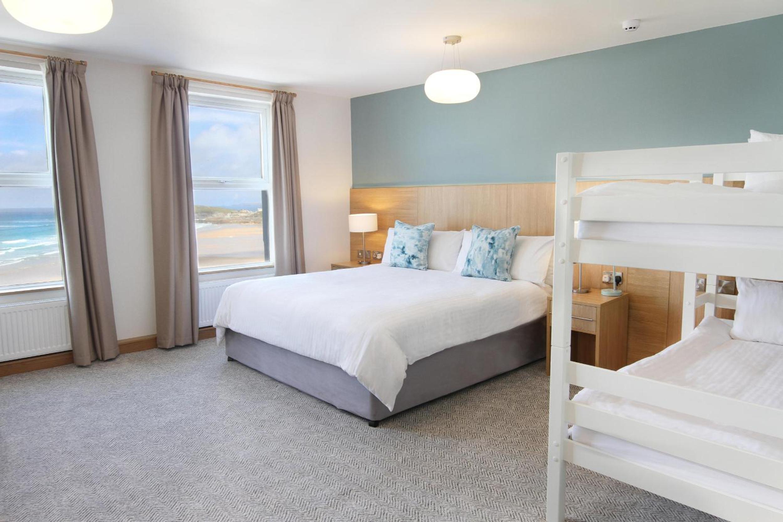 Family Room (2 Adults + 2 Children) with Sea View photo 1