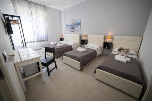 Quadruple Room - Photo 8