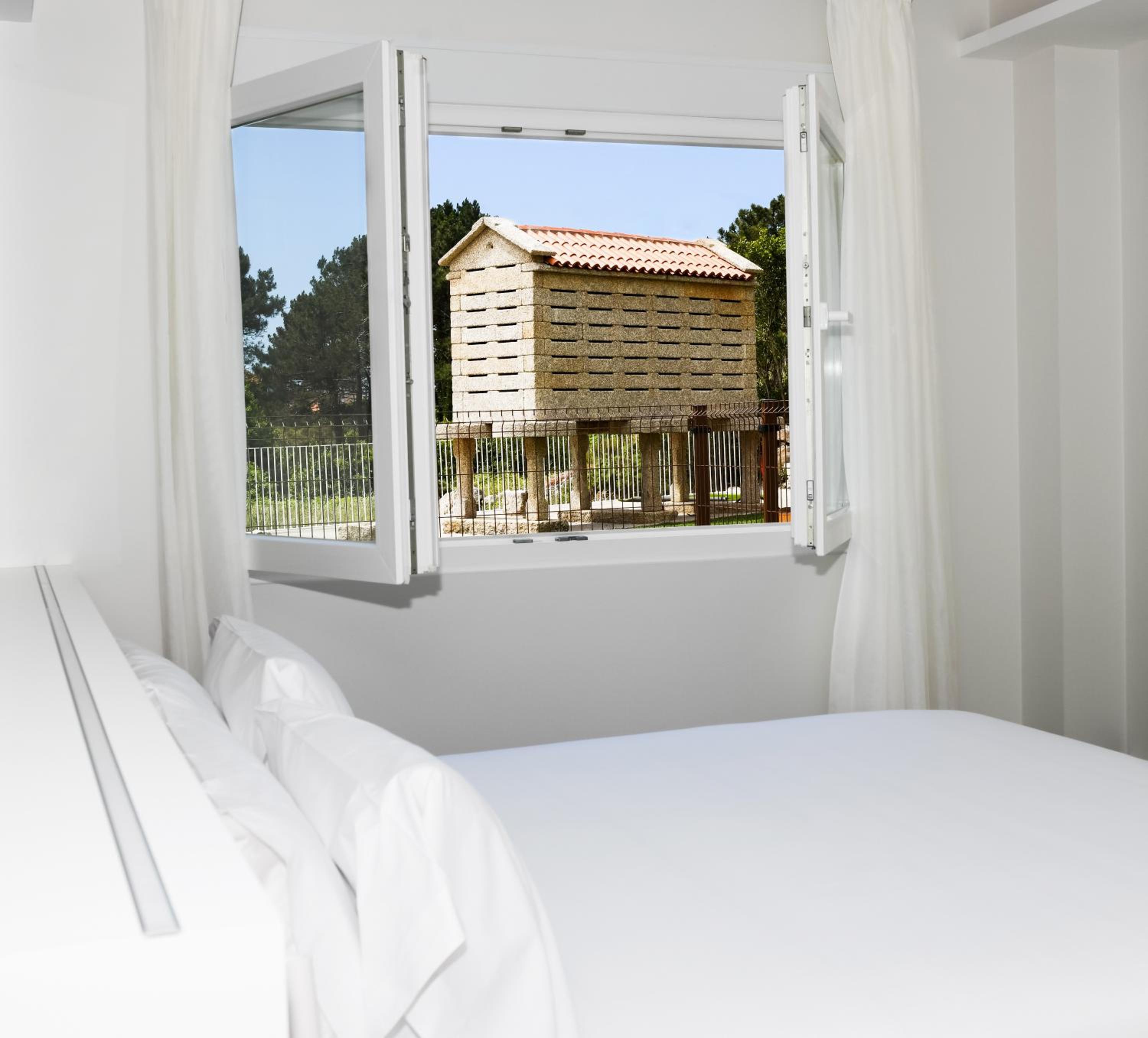 Habitación Doble Estándar o con Dos Camas Individuales.